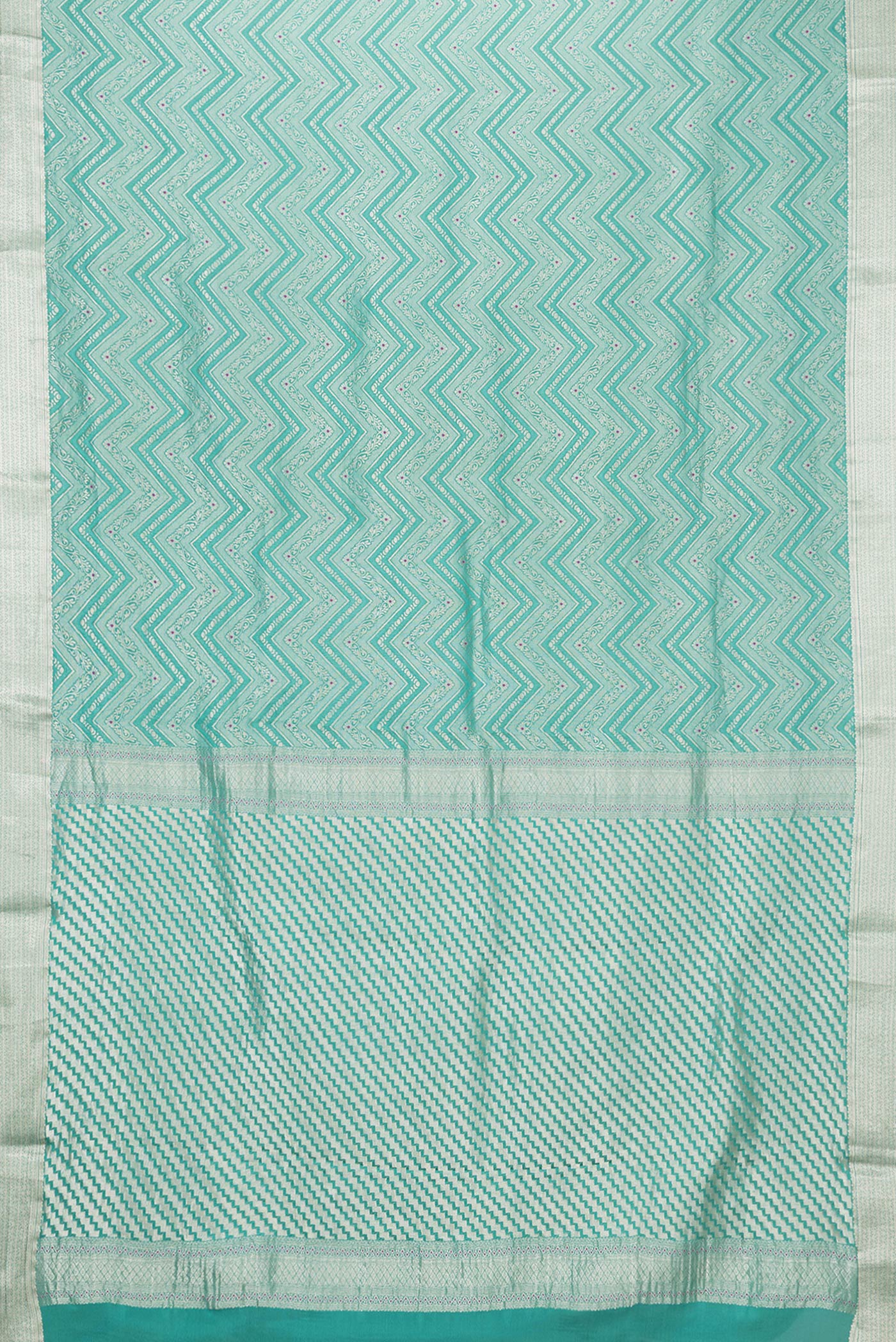 Flat view of Sea Green Dual Tone Tussar Silk Saree with Zari Brocade on the body and Zari Border. 