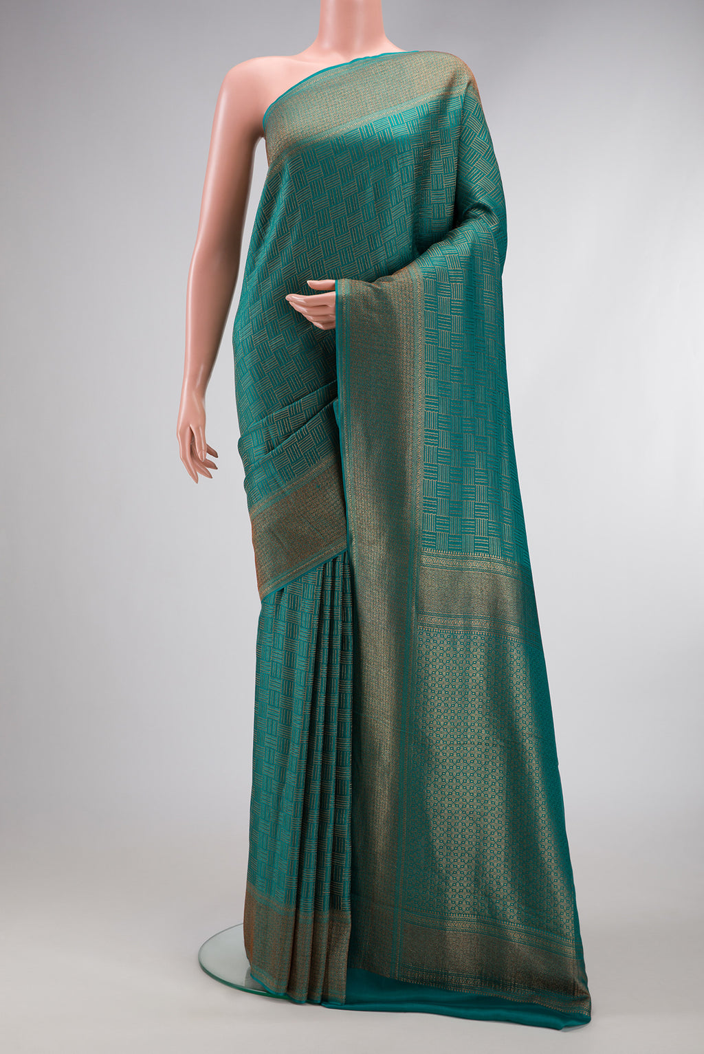 Green Dual Tone Banarasi Georgette Saree with Zari Brocade on the body and Zari Border.  displayed on a mannequin