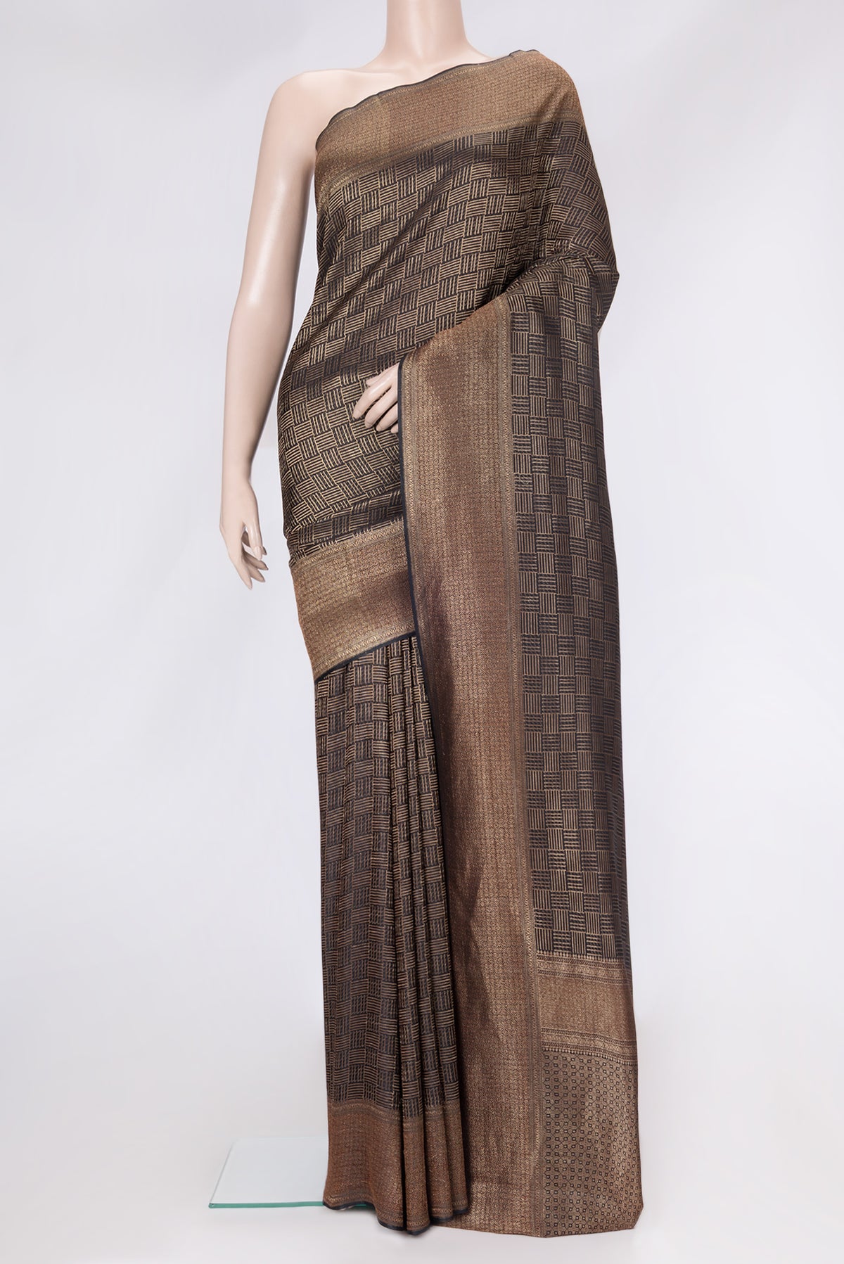 Black Dual Tone Tussar Silk Saree with Zari Brocade on the body and Zari Border.  displayed on a mannequin