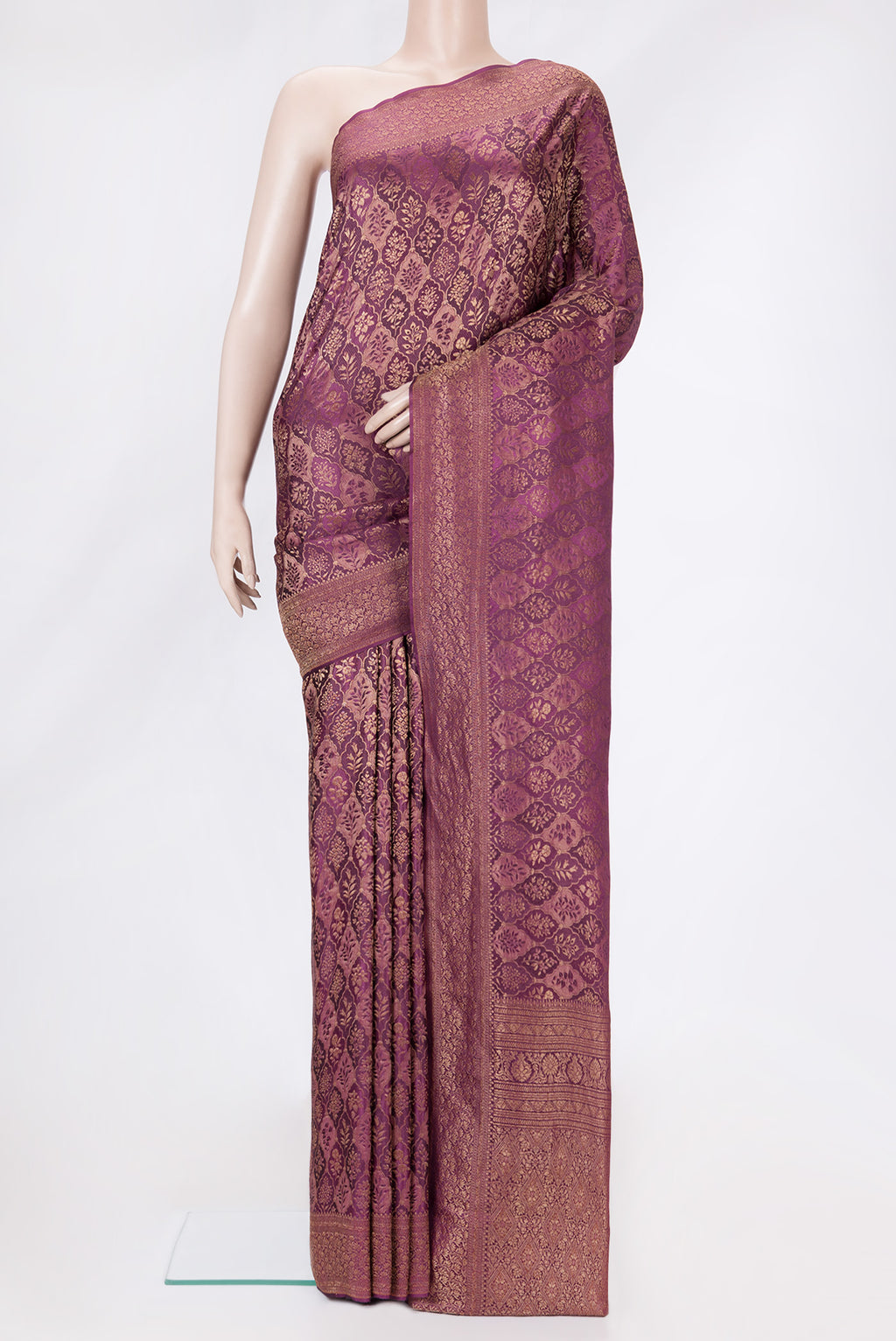 Magenta Dual Tone Banarasi Georgette Saree with Zari Brocade on the body and Zari Border.  displayed on a mannequin
