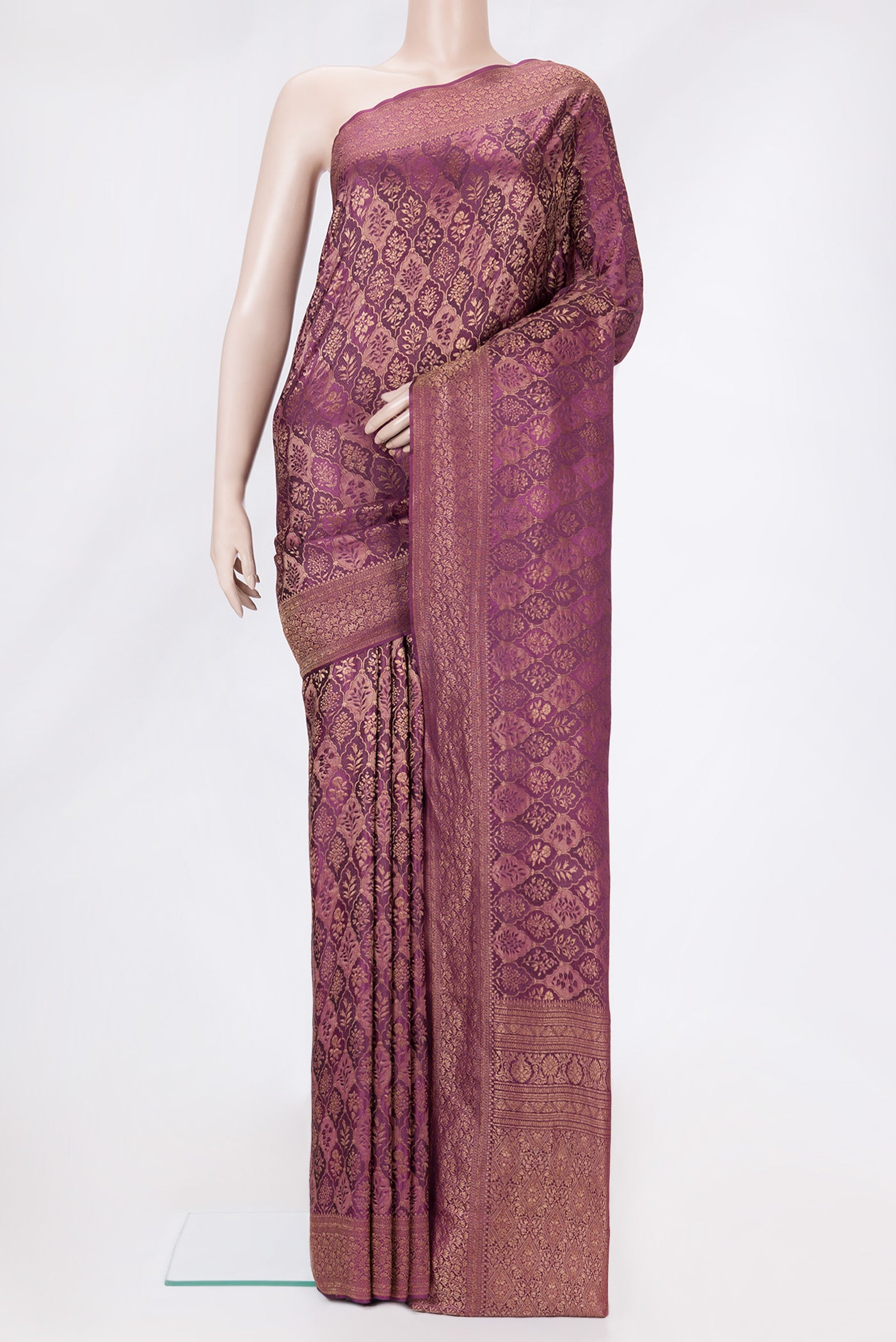Magenta Dual Tone Banarasi Georgette Saree with Zari Brocade on the body and Zari Border.  displayed on a mannequin