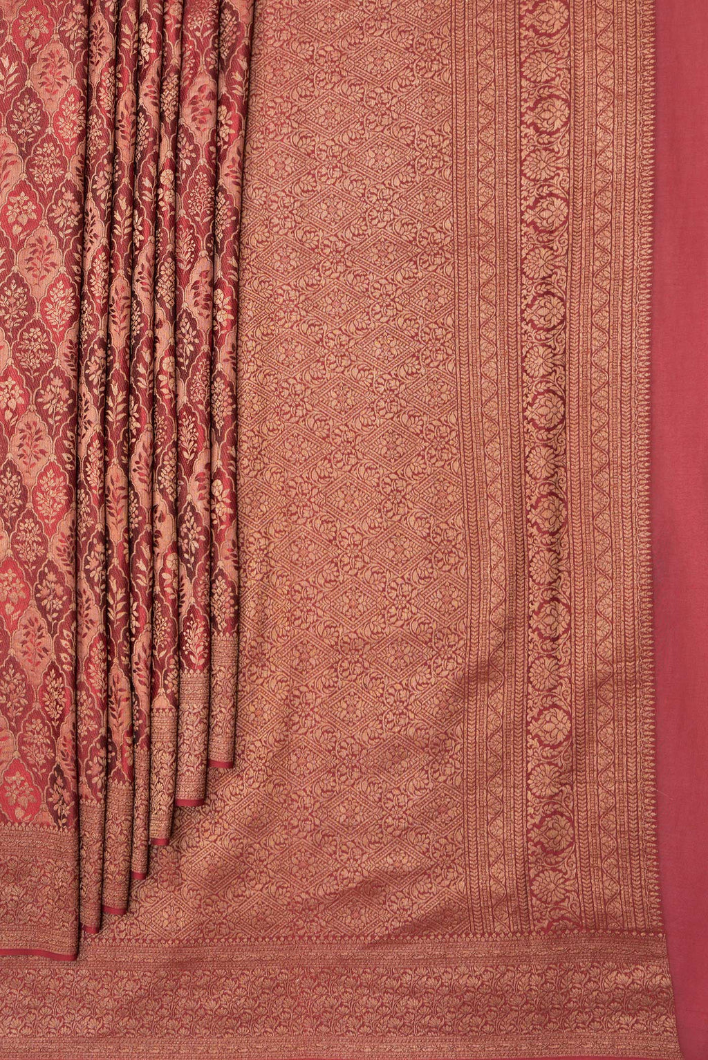 Pleats and pallu of Maroon Dual Tone Banarasi Georgette Saree with Zari Brocade on the body and Zari Border. 