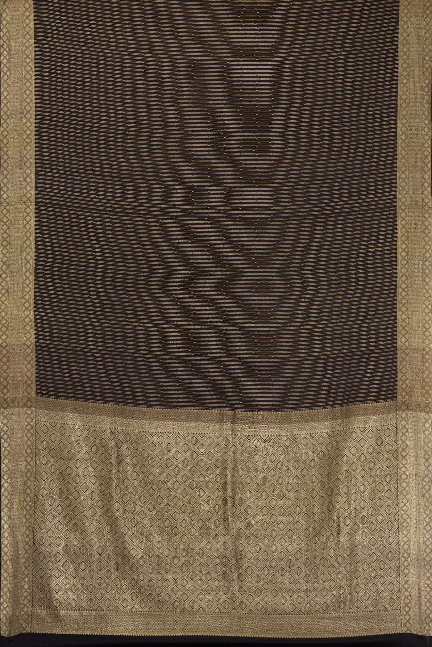 Flat view of Black Mysore Crepe Saree with Stripes on the body and Zari Border. 