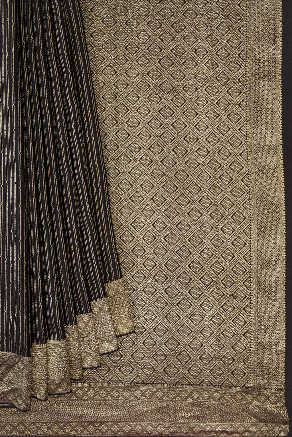 Pleats and pallu of Black Mysore Crepe Saree with Stripes on the body and Zari Border. 