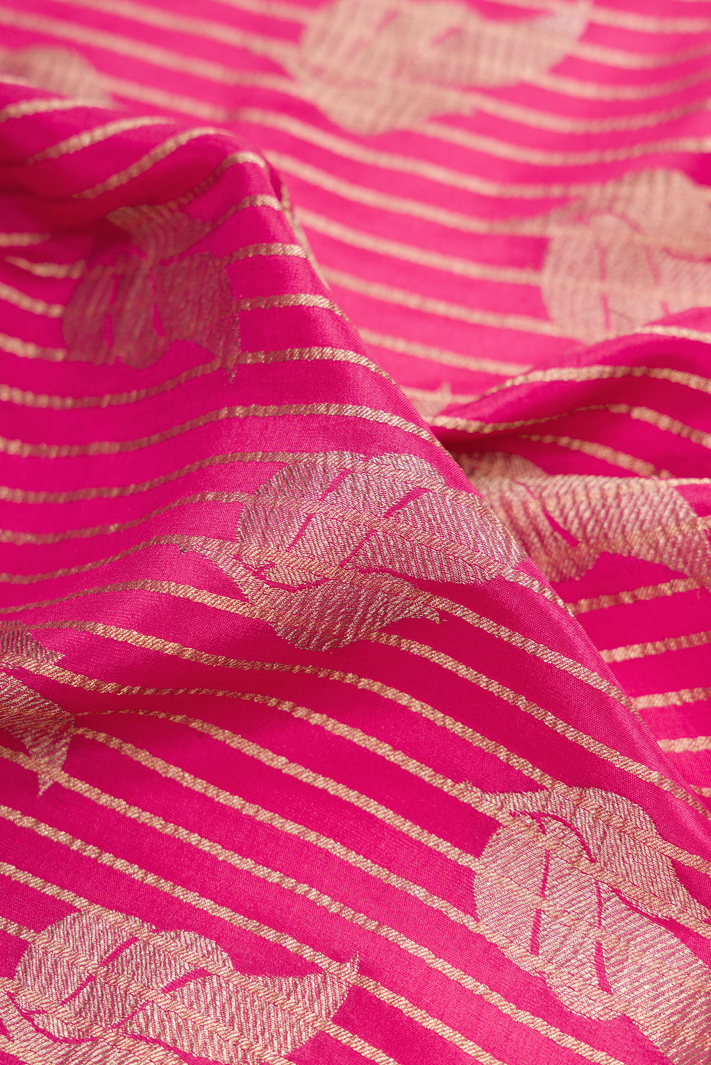 Close up of Pink Mysore Crepe Saree with Stripes on the body and Zari Border.  displaying folds