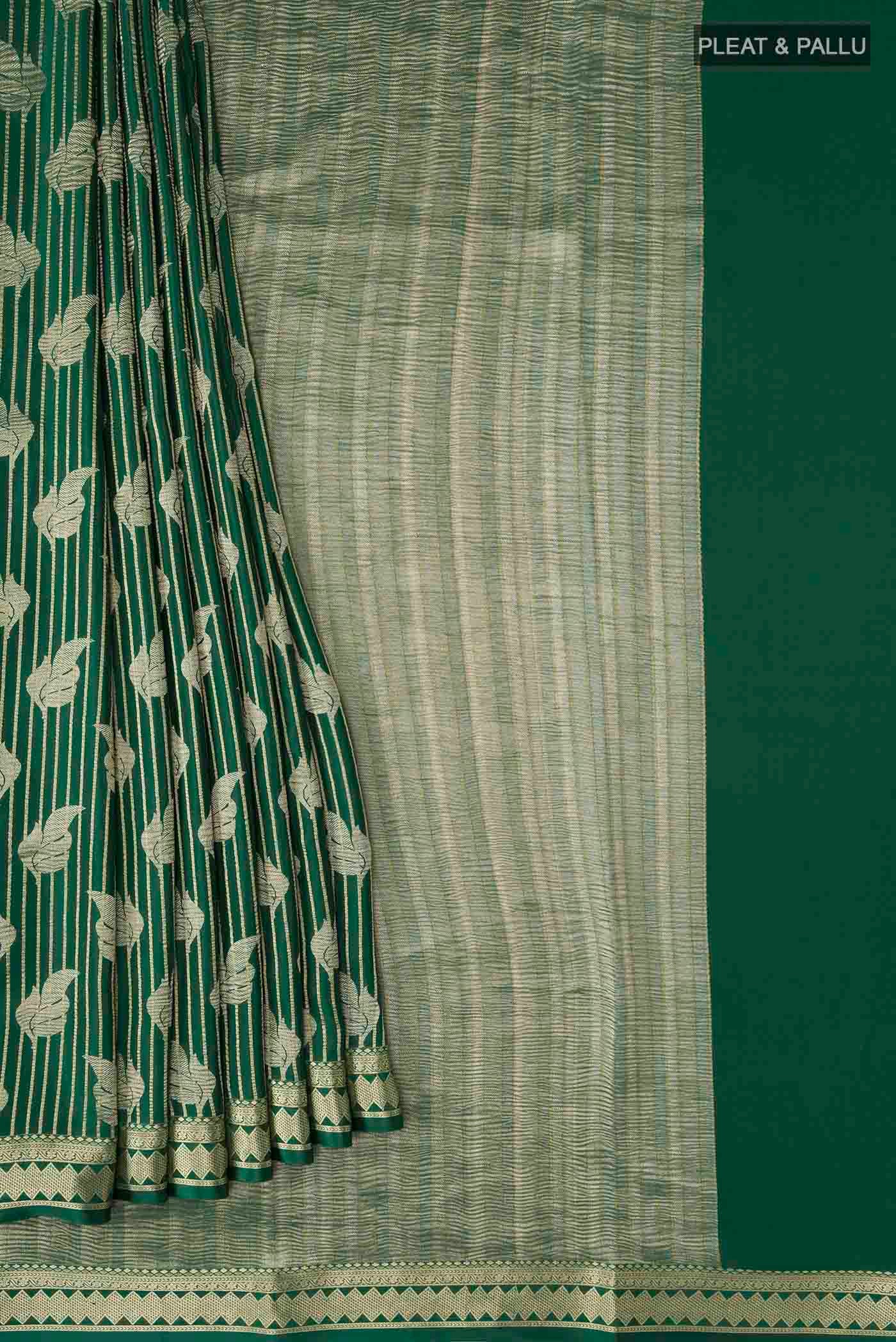 Pleats and pallu of Green Mysore Crepe Saree with Zari Butta on the body and Zari Border