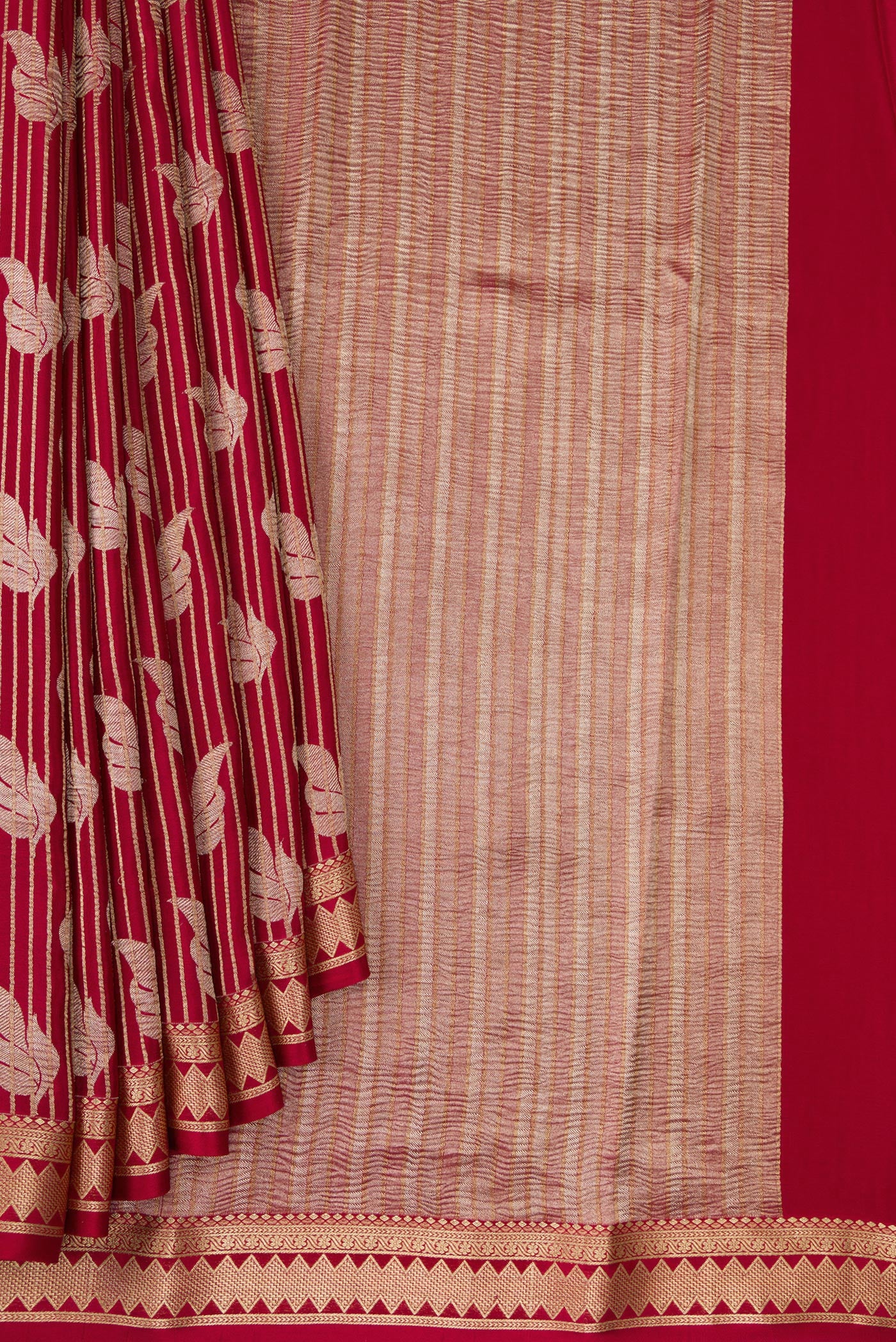 Pleats and pallu of Maroon Banarasi Georgette Saree with Zari Brocade on the body and Zari Border. 