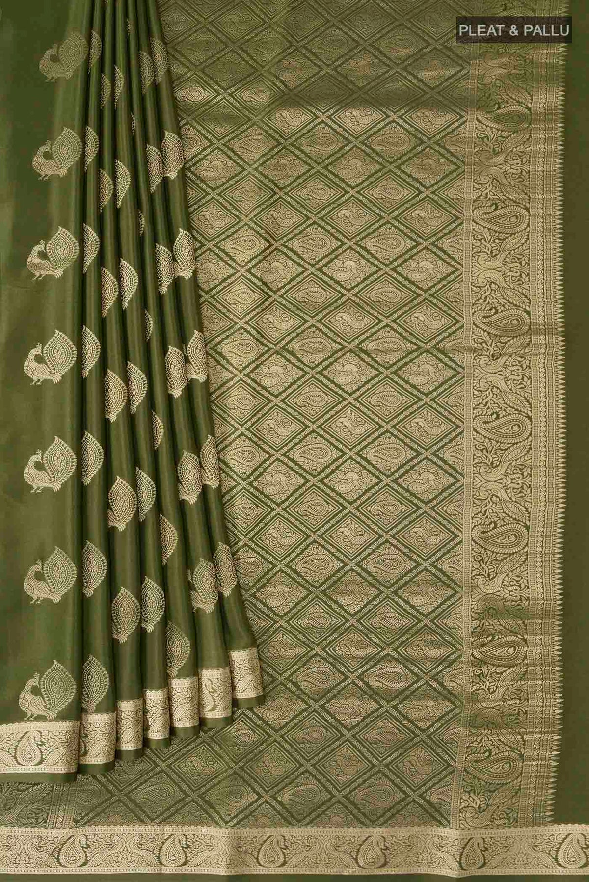 Pleats and pallu of Green Mysore Crepe Saree with Zari Butta on the body and Zari Border