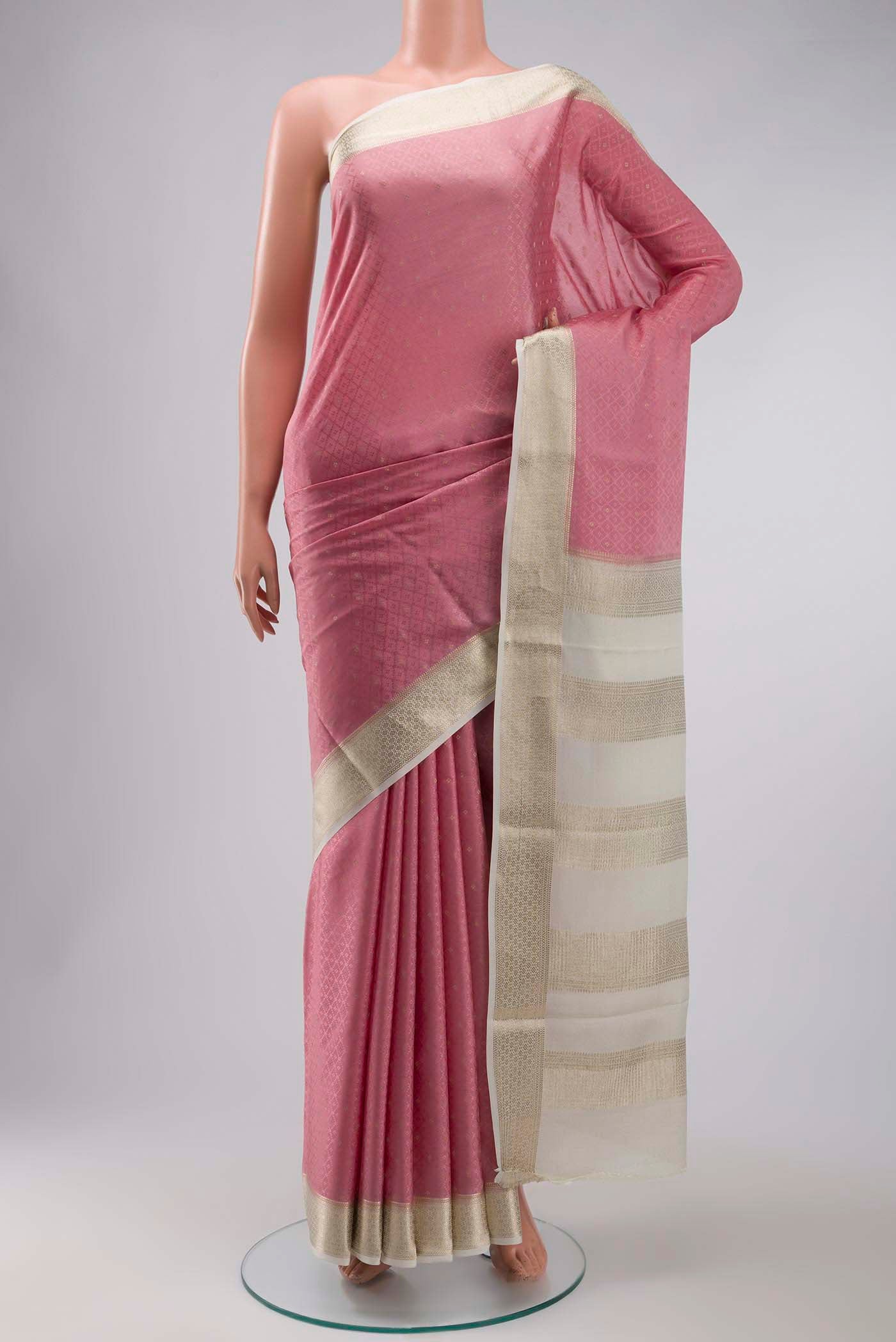 Pink Mysore Crepe Saree with Jacquard With Zari Butta on the body and Zari Border displayed on a mannequin