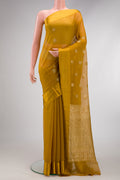 Mustard Mysore Chiffon Saree with Zari Butta on the body and Thread Border.  displayed on a mannequin
