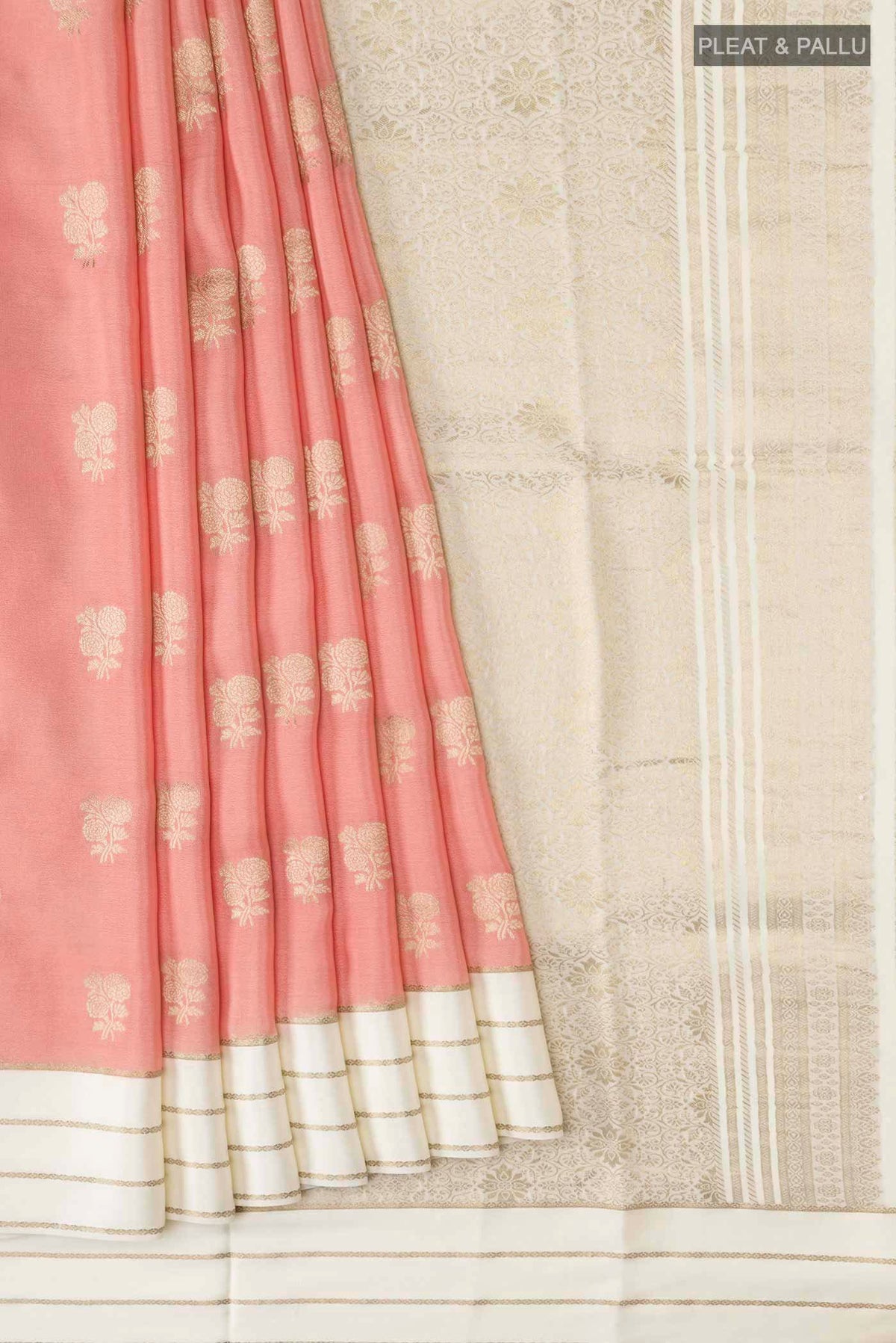 Pleats and pallu of Peach Mysore Crepe Saree with Zari Butta on the body and Zari Border