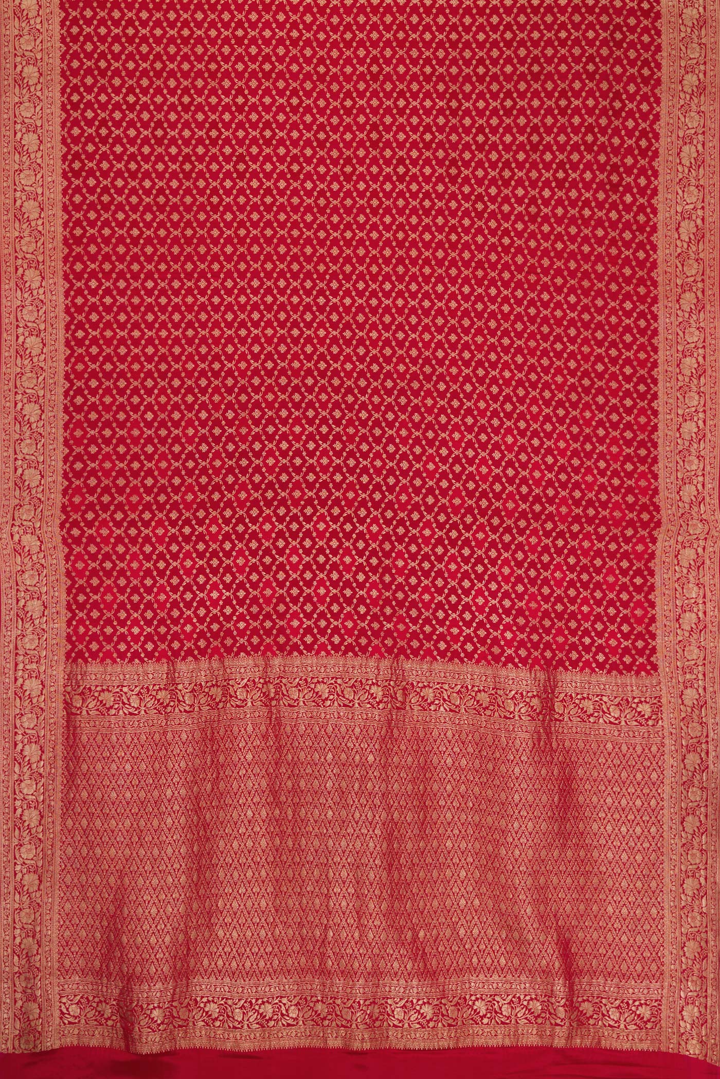 Flat view of Maroon Dual Tone Georgette Saree with Zari Brocade on the body and Zari Border. 