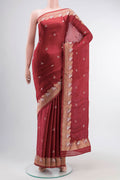 Red Satin Silk Saree with Zari Butta on the body and Zari Border displayed on a mannequin