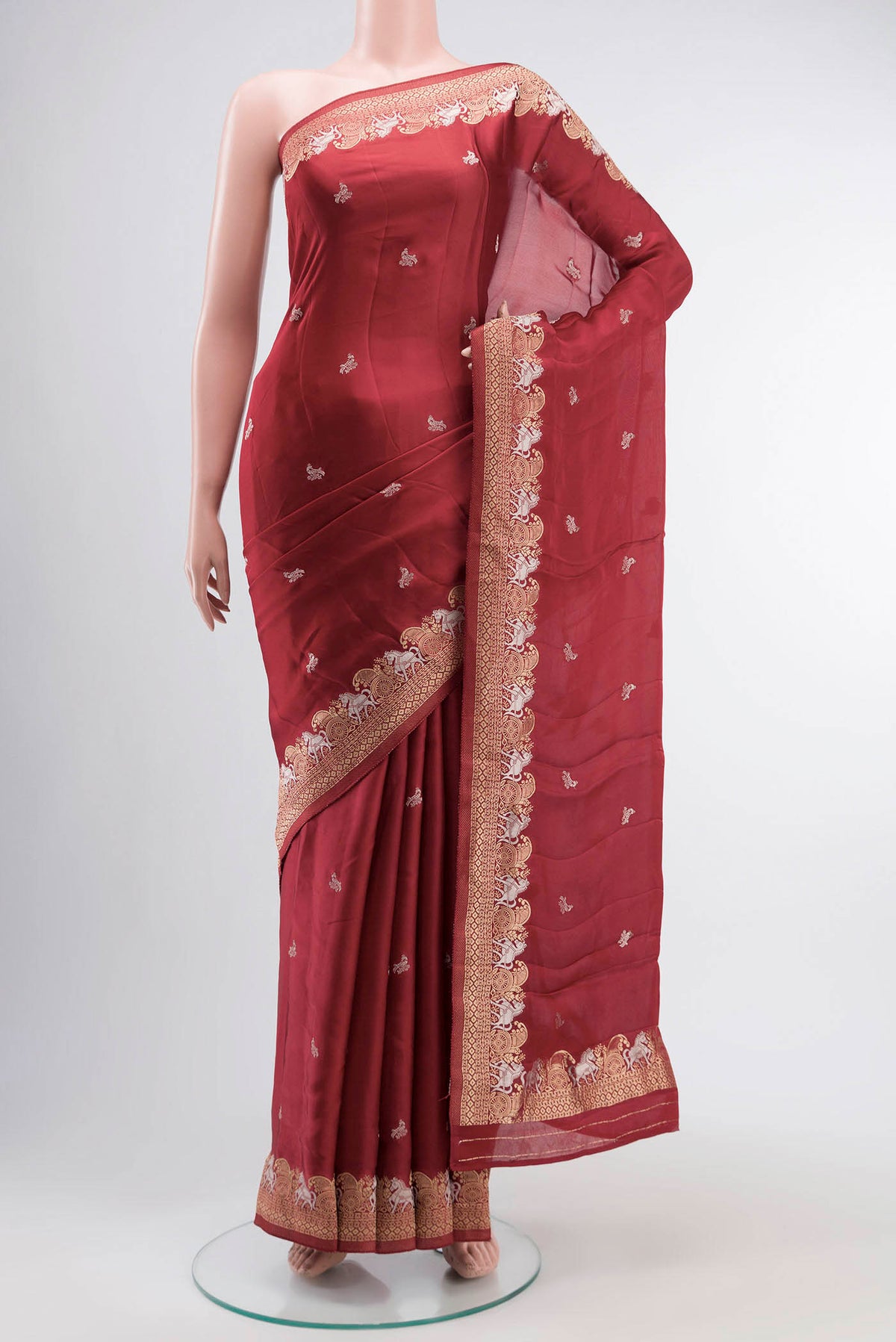 Red Satin Silk Saree with Zari Butta on the body and Zari Border displayed on a mannequin