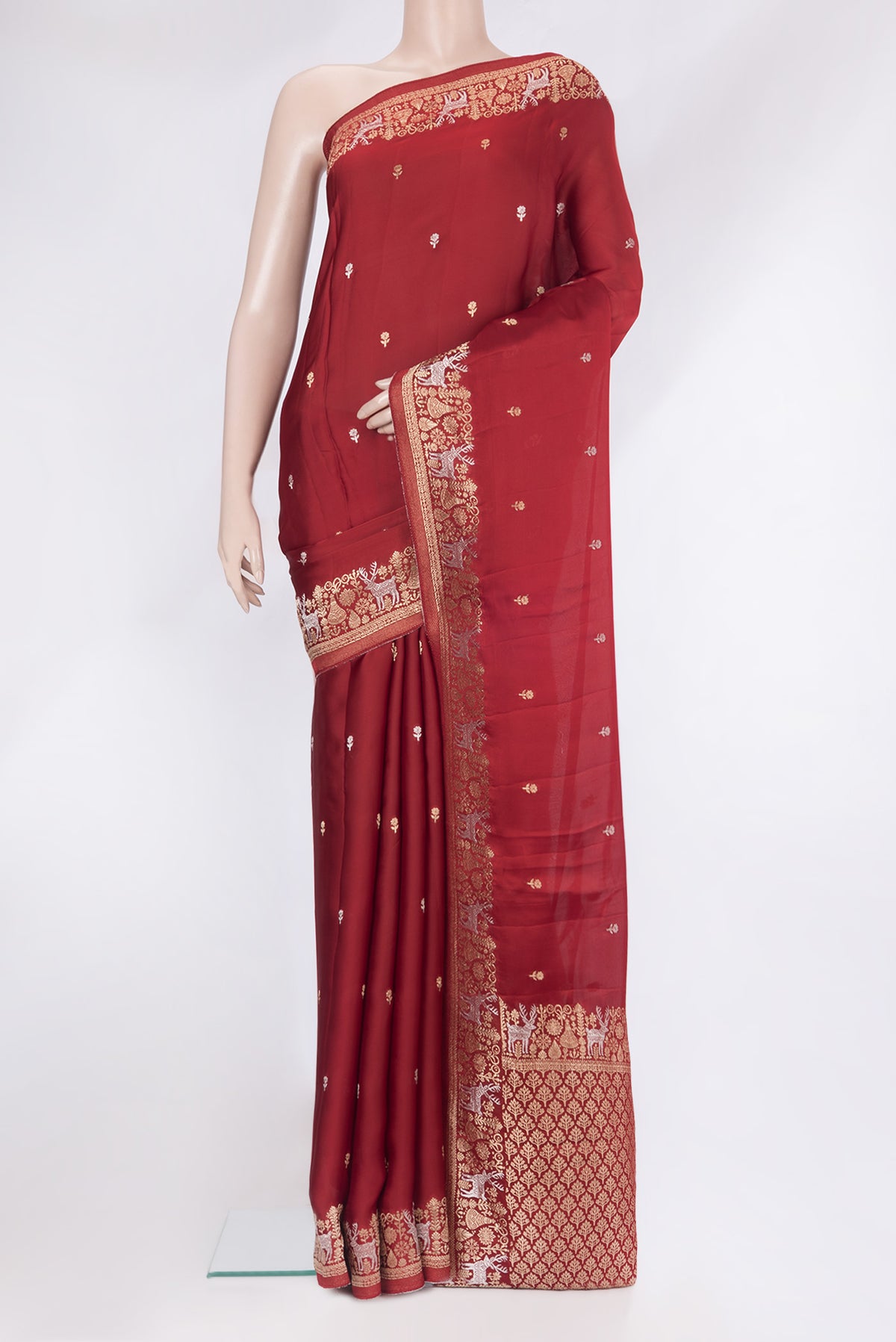 Maroon Dual Tone Blended Satin Silk Saree with Zari Butta on the body and Zari Border.  displayed on a mannequin