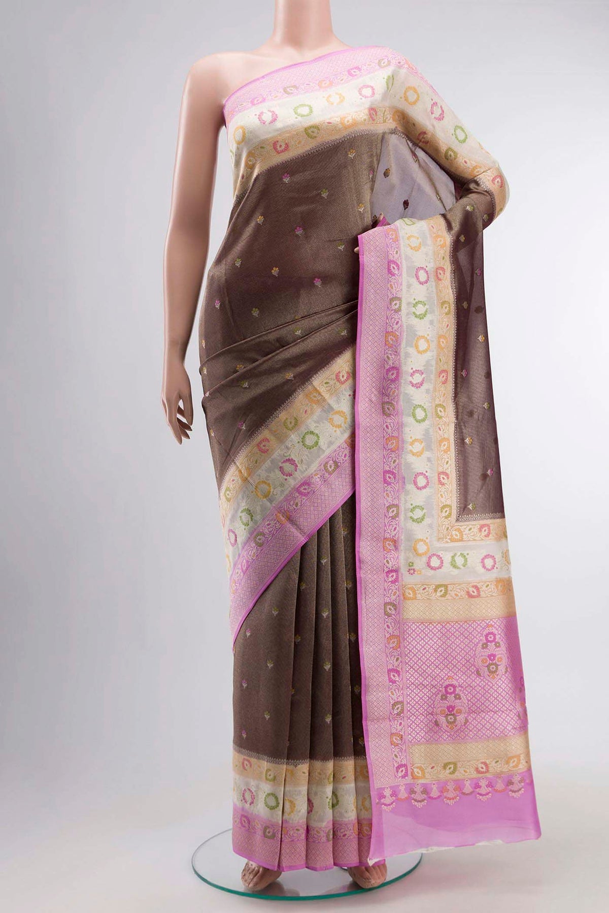 Brown Banarasi Silk Saree with Zari Butta on the body and Zari Border displayed on a mannequin