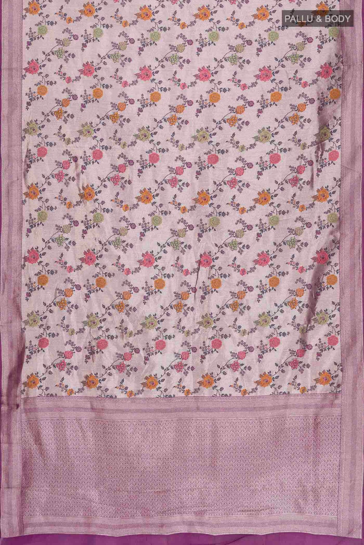 Flat view of Purple Tissue Silk Saree with Zari Brocade on the body and Zari Border