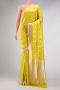 Yellow Dual Tone Banarasi Silk Saree with Zari Brocade on the body and Zari Border displayed on a mannequin