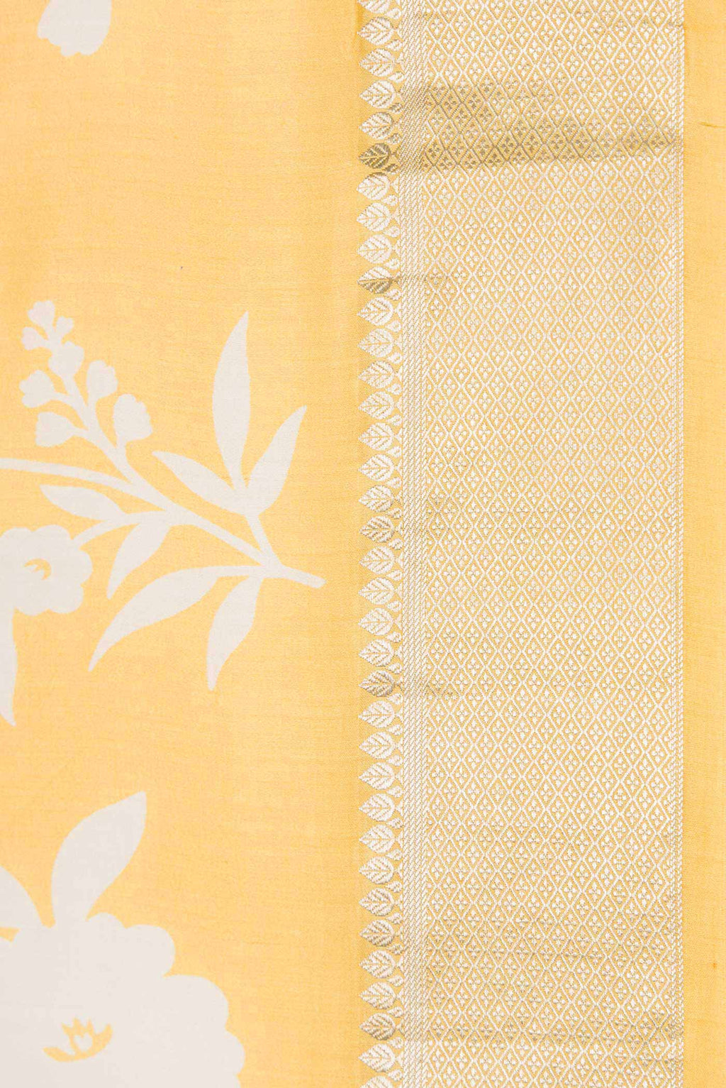 Border image of Yellow Dual Tone Tussar Silk Saree with Printed design on the body and Zari Border