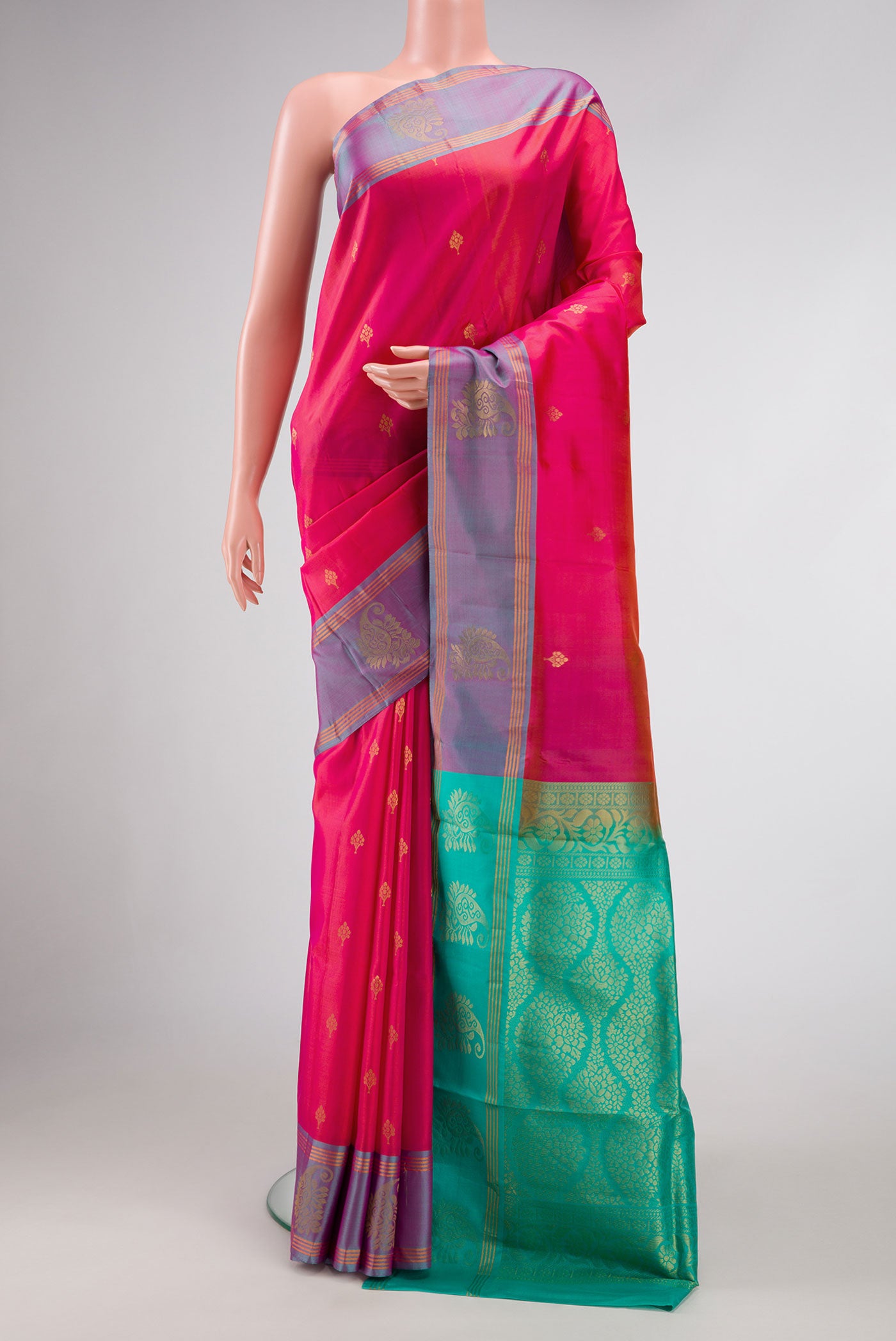 Pink Dual Tone Soft Silk Saree with Zari Butta on the body and Fancy Border.  displayed on a mannequin