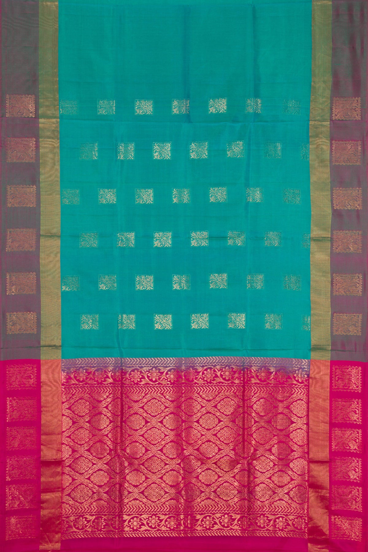 Flat view of Peacock Blue Dual Tone Soft Silk Saree with Zari Butta on the body and Fancy Border. 