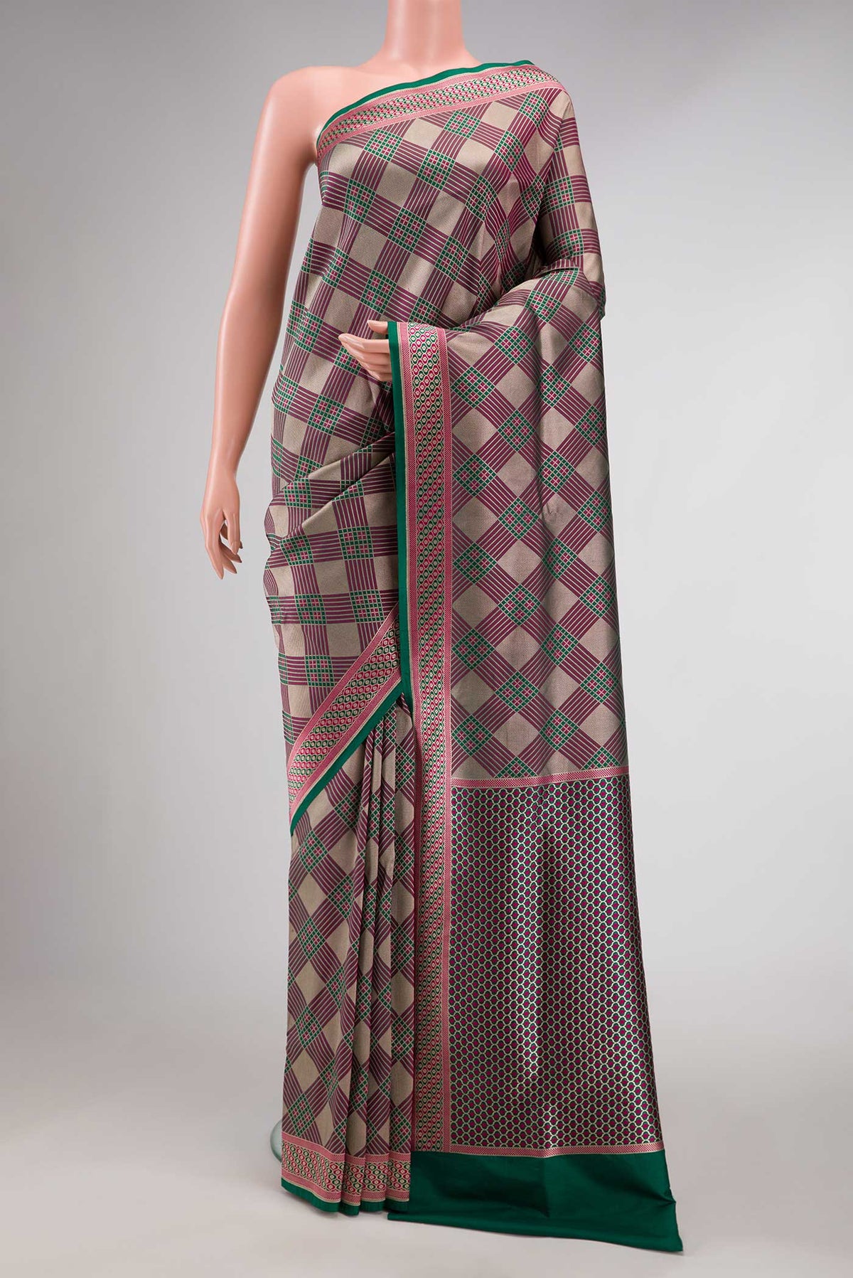 Dark Pink Dual Tone Banarasi Silk Saree with Zari Brocade on the body and Fancy Border displayed on a mannequin