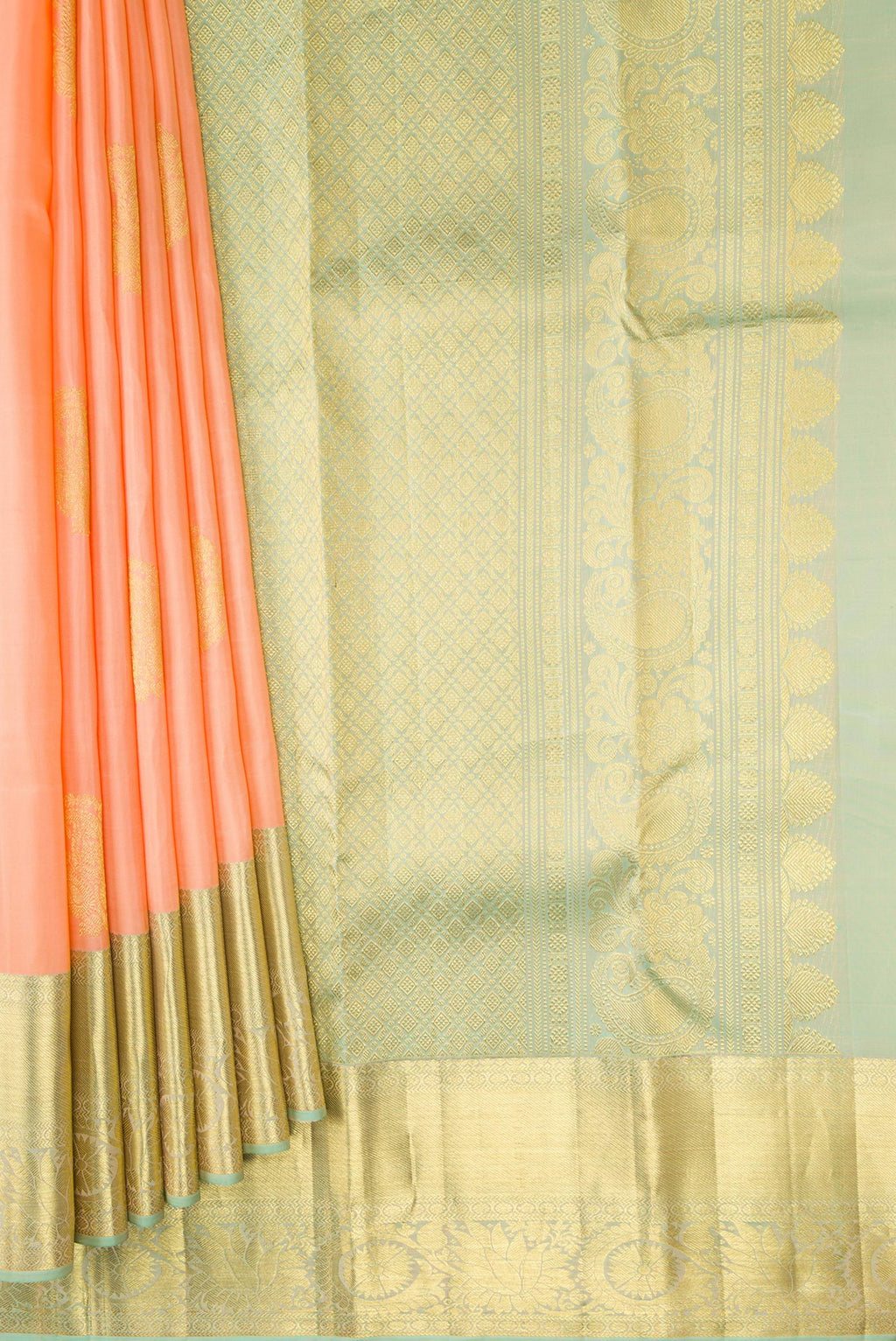 Pleats and pallu of Peach Dual Tone Kanjivaram Silk Saree with Zari Butta on the body and Zari Border. 