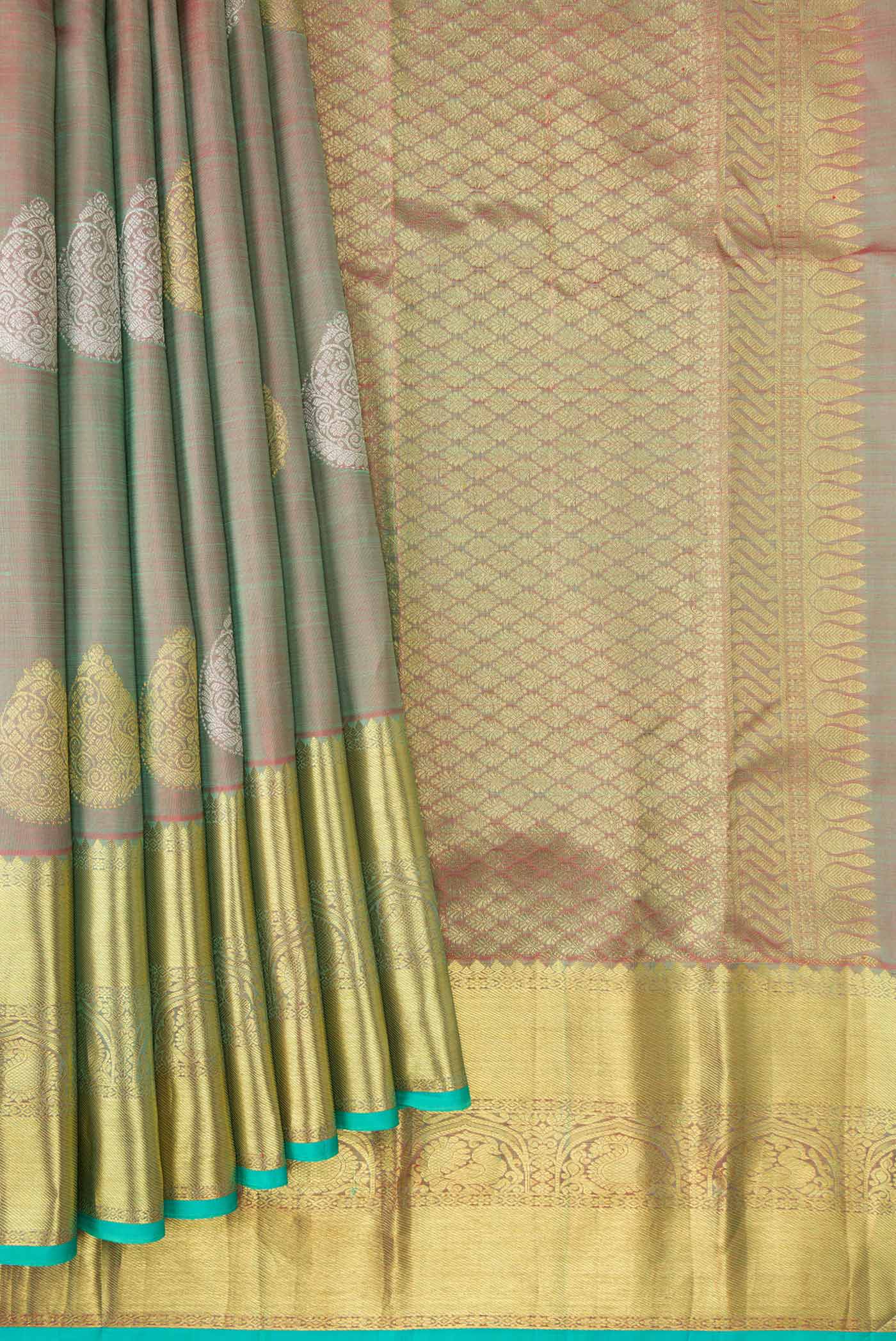 Pleats and pallu of Green Dual Tone Kanjivaram Silk Saree with Zari Brocade on the body and Zari Border. 