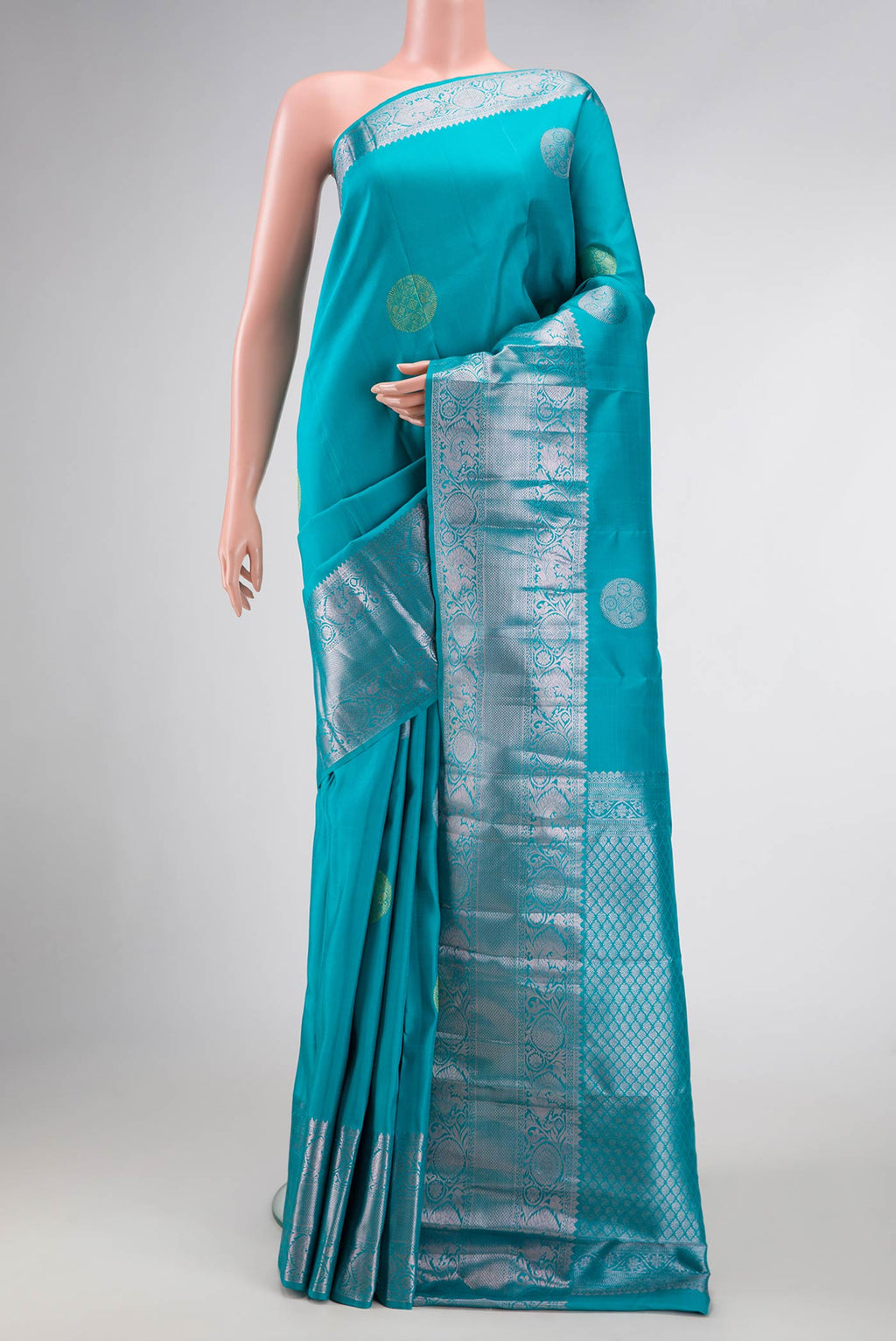 Sky Blue Dual Tone Kanjivaram Silk Saree with Zari Brocade on the body and Zari Border.  displayed on a mannequin