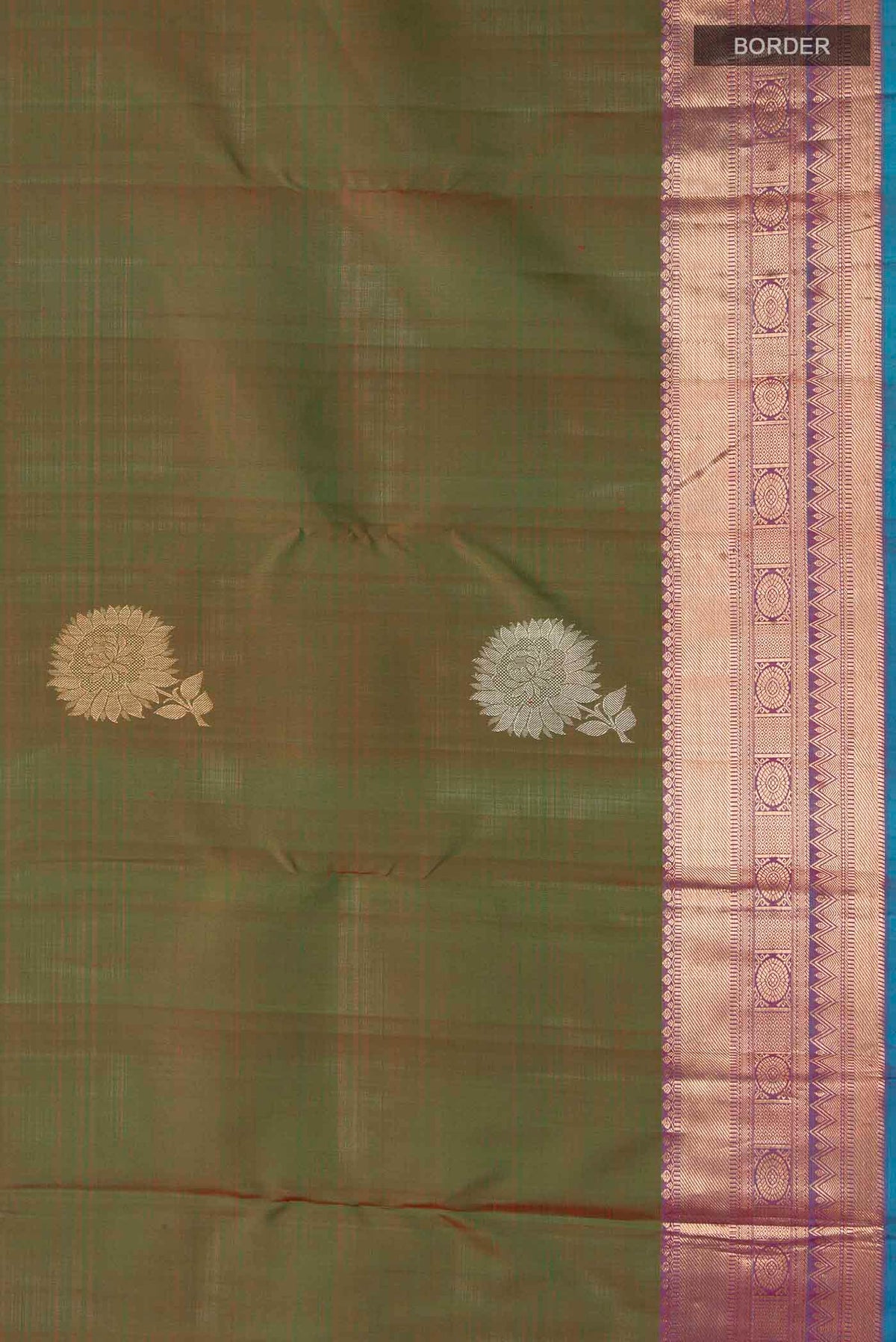 Border image of Green Kanchipuram Silk Saree with Zari Butta on the body and Zari Border