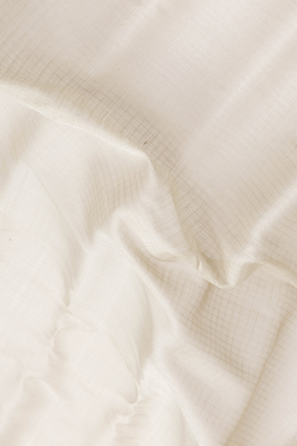 Close up of Grey Dual Tone Gadwal Silk Saree with Checked design on the body and Zari Border.  displaying folds