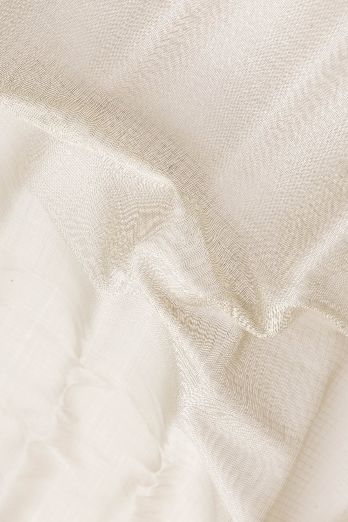 Close up of Grey Dual Tone Gadwal Silk Saree with Checked design on the body and Zari Border.  displaying folds
