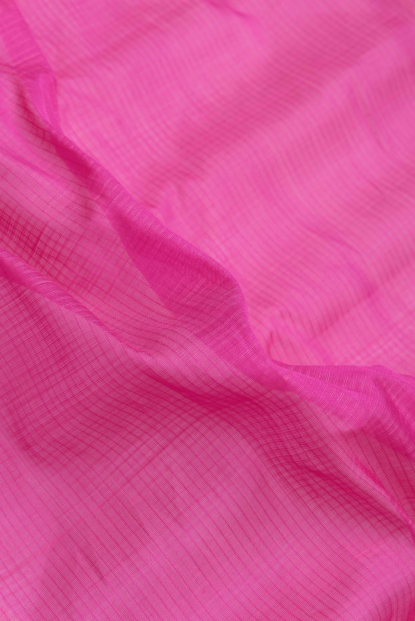 Close up of Pink Dual Tone Gadwal Silk Saree with Checked design on the body and Zari Border.  displaying folds