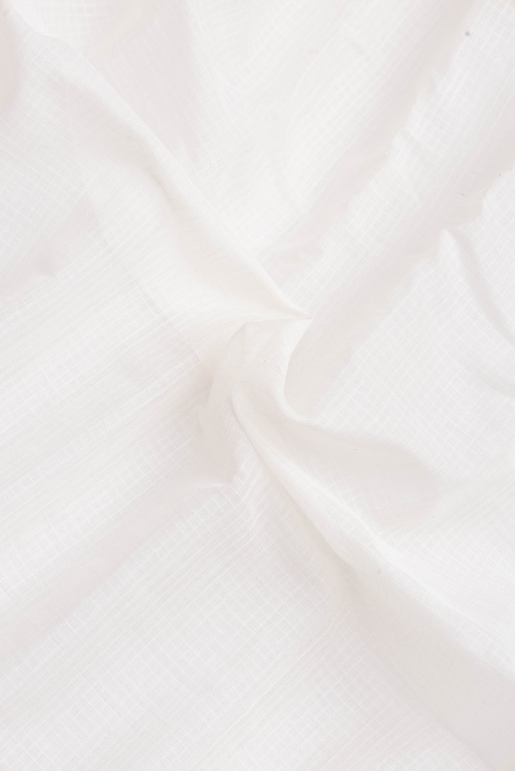 Close up of White Dual Tone Gadwal cotton Saree with Checked design on the body and Zari Border.  displaying folds