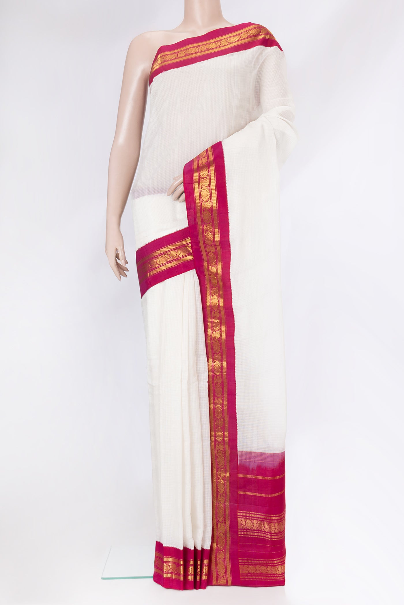 White Dual Tone Gadwal cotton Saree with Checked design on the body and Zari Border.  displayed on a mannequin