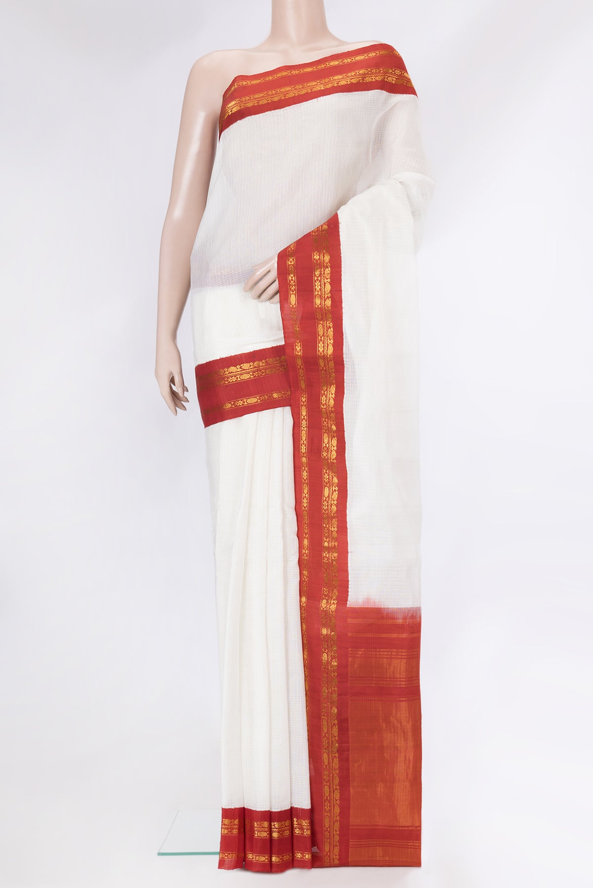 White Dual Tone Kanchipuram Silk Saree with Checked design on the body and Zari Border.  displayed on a mannequin