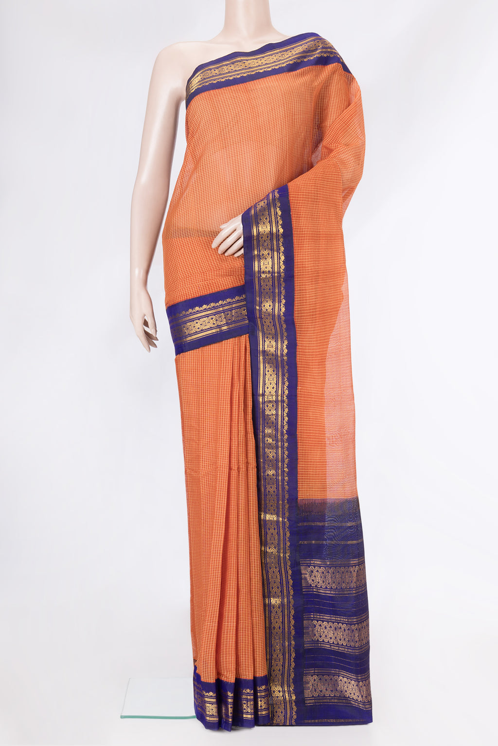 Orange Dual Tone Gadwal Silk Cotton Saree with Checked design on the body and Zari Border.  displayed on a mannequin