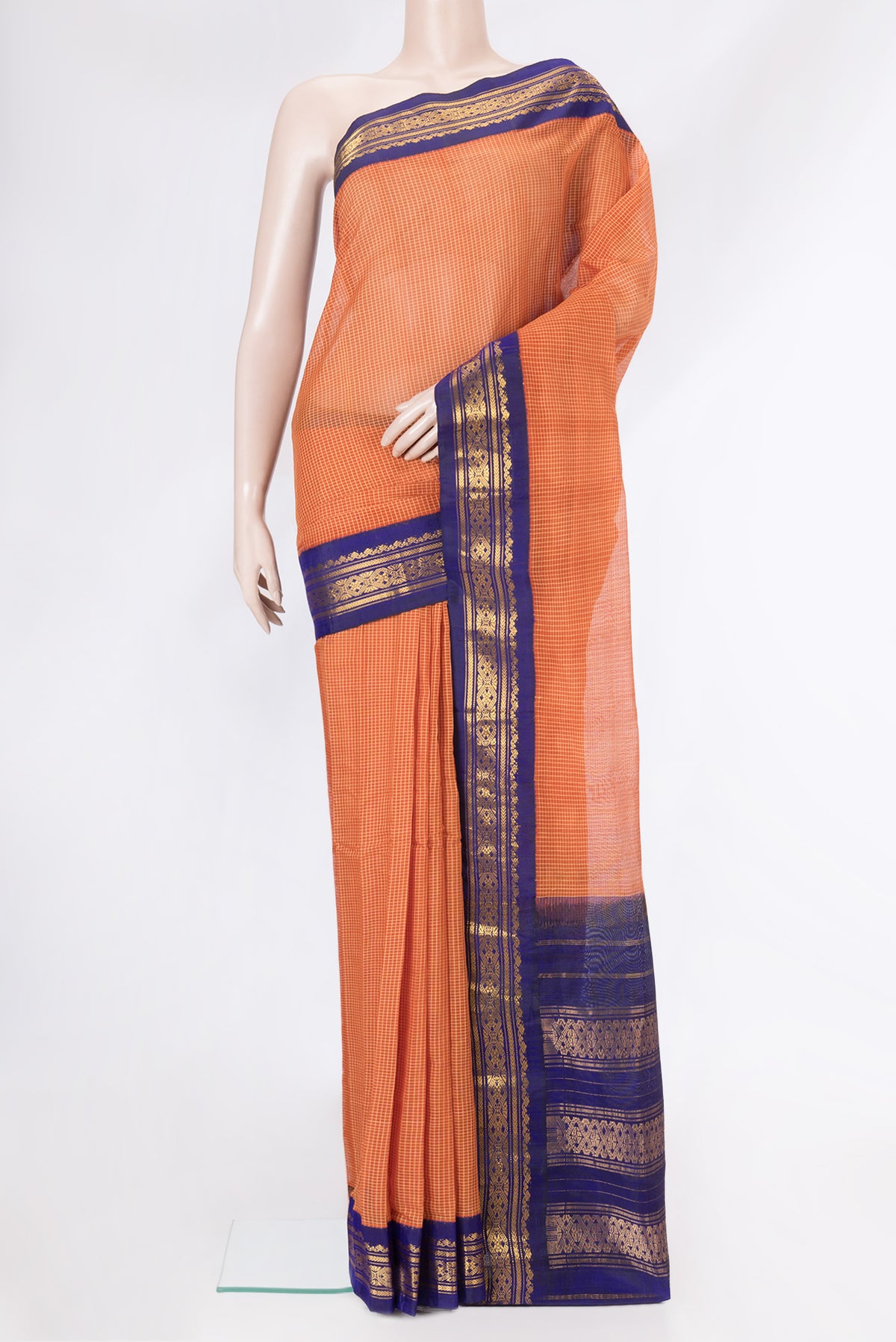 Orange Dual Tone Gadwal Silk Cotton Saree with Checked design on the body and Zari Border.  displayed on a mannequin