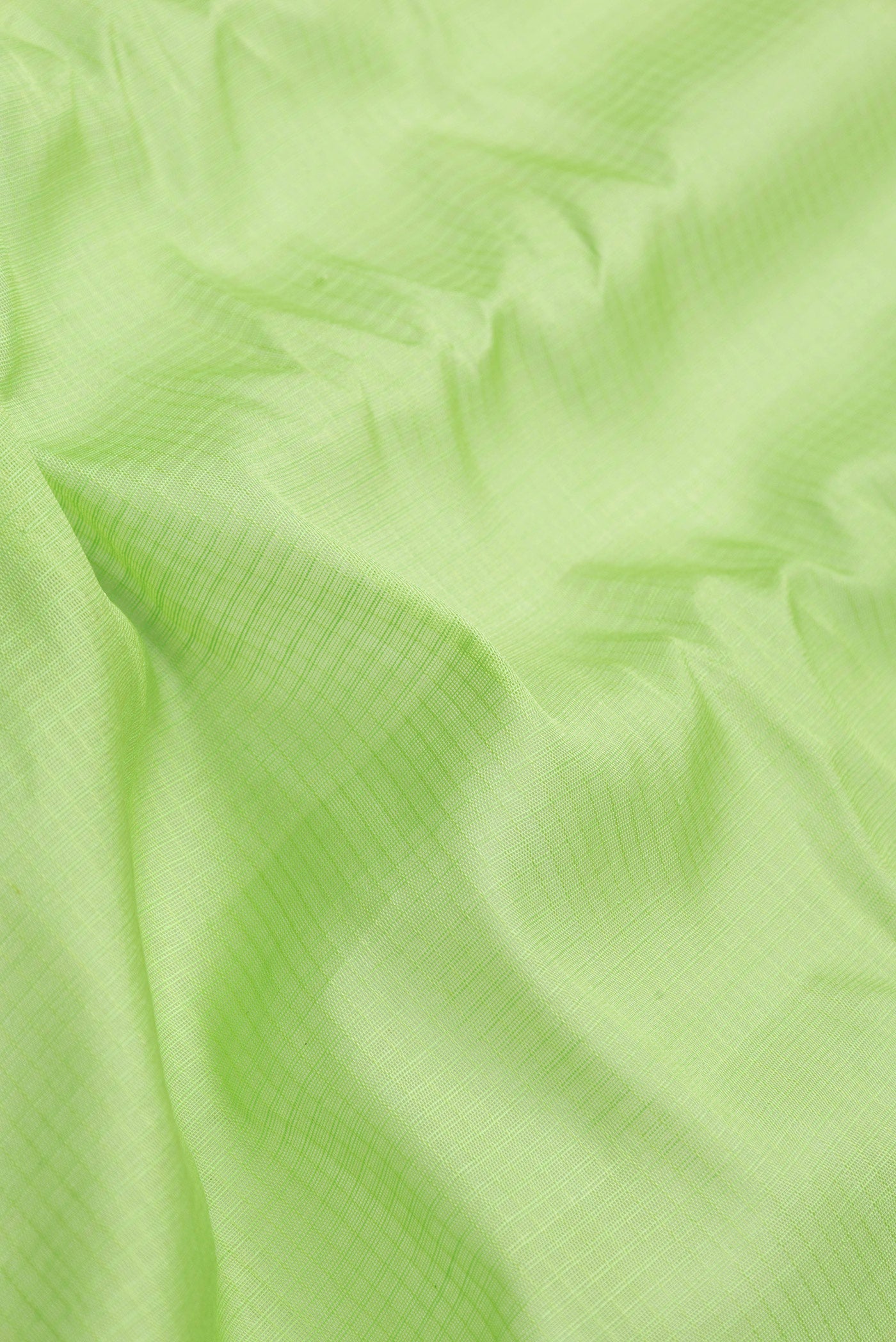 Close up of Parrot Green Dual Tone Gadwal Silk Saree with Checked design on the body and Zari Border.  displaying folds
