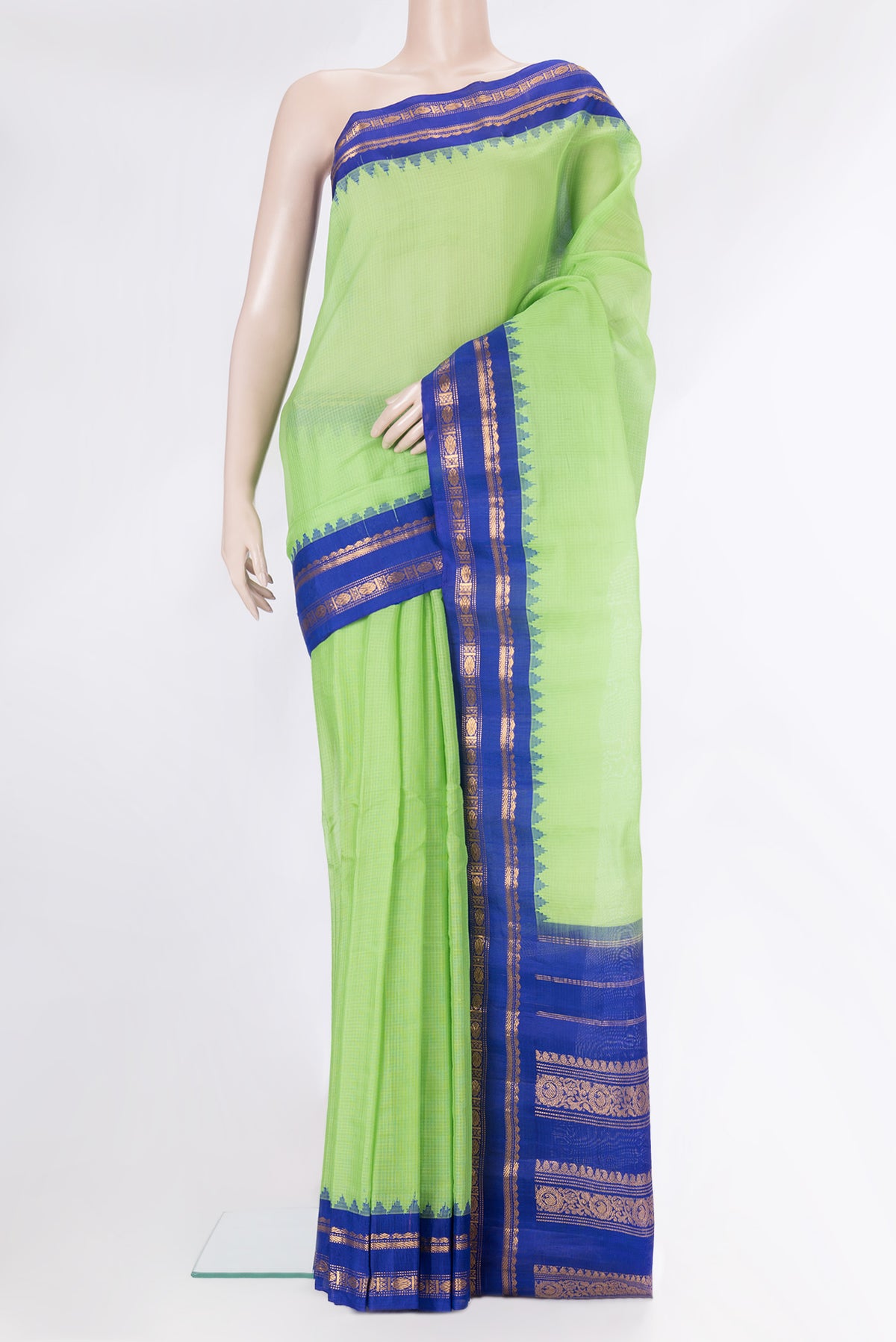 Parrot Green Dual Tone Gadwal Silk Saree with Checked design on the body and Zari Border.  displayed on a mannequin