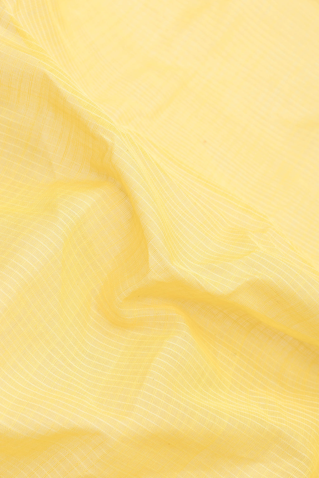 Close up of Yellow Dual Tone Gadwal Silk Saree with Checked design on the body and Zari Border.  displaying folds