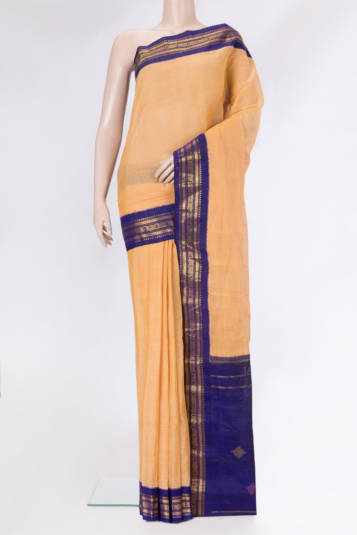 Orange Dual Tone Kanchipuram Silk Saree with Checked design on the body and Zari Border.  displayed on a mannequin