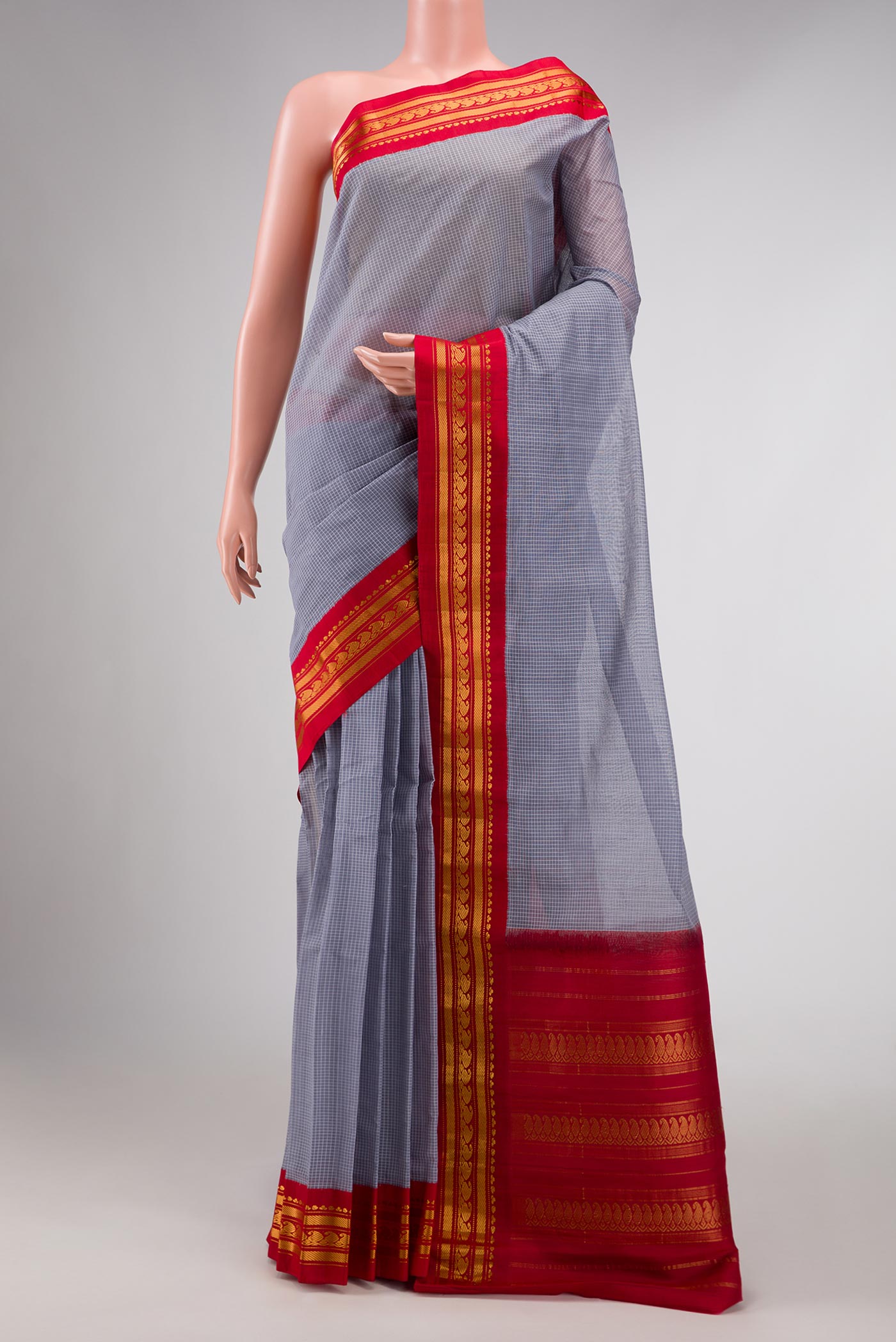 Light Blue Dual Tone Gadwal cotton Saree with Checked design on the body and Zari Border displayed on a mannequin