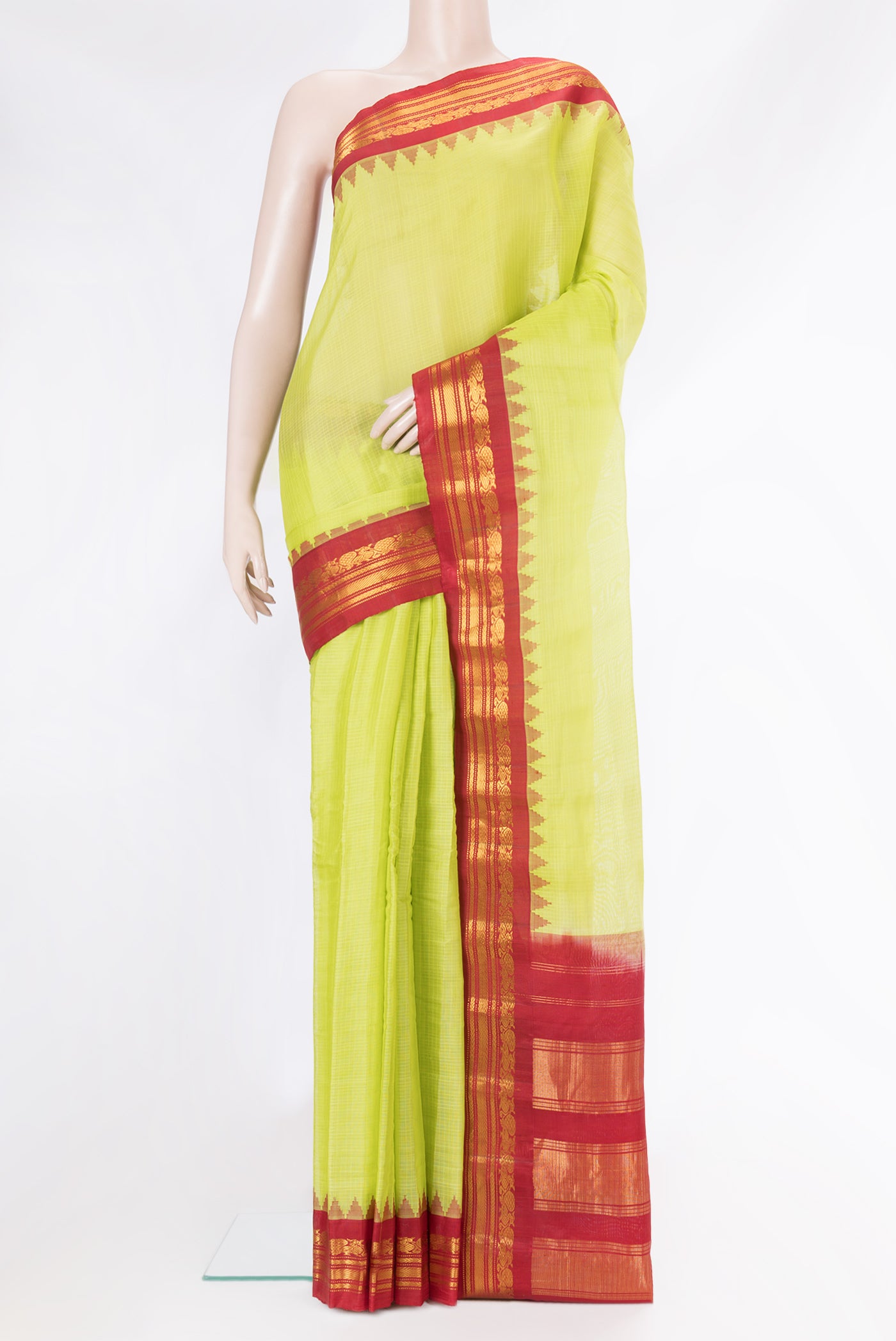 Parrot Green Dual Tone Gadwal Silk Saree with Checked design on the body and Zari Border.  displayed on a mannequin