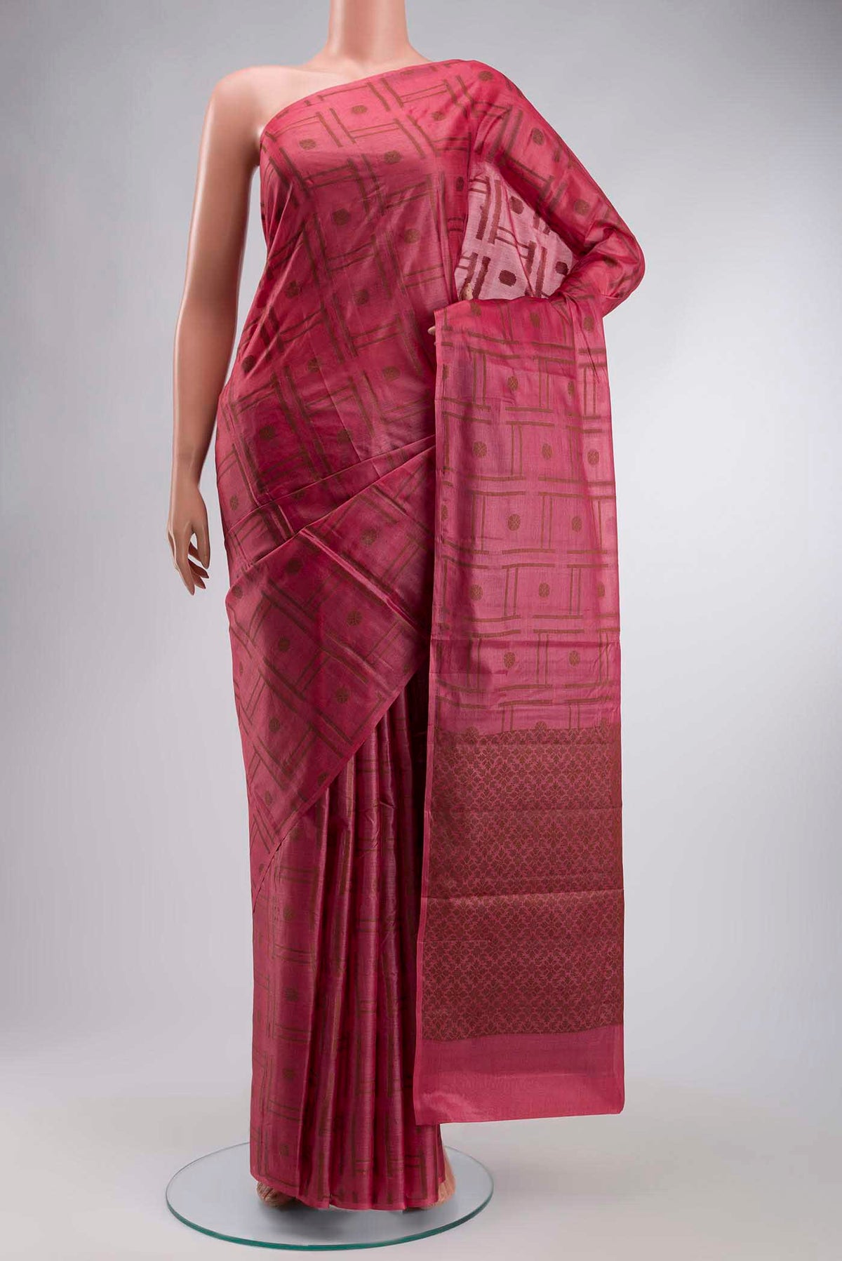 Coral Banarasi Tussar Silk Saree with Thread Butta on the body and Without Border displayed on a mannequin