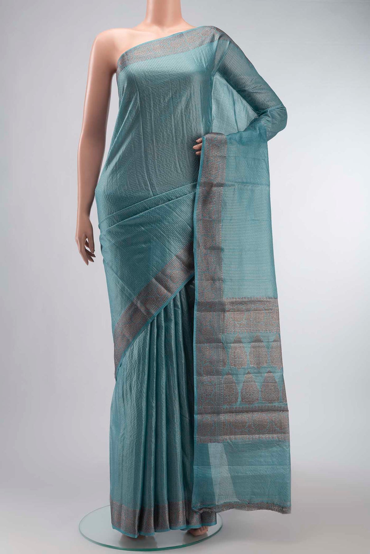 Blue Banarasi Raw Silk Saree with Checked design on the body and Zari Border displayed on a mannequin
