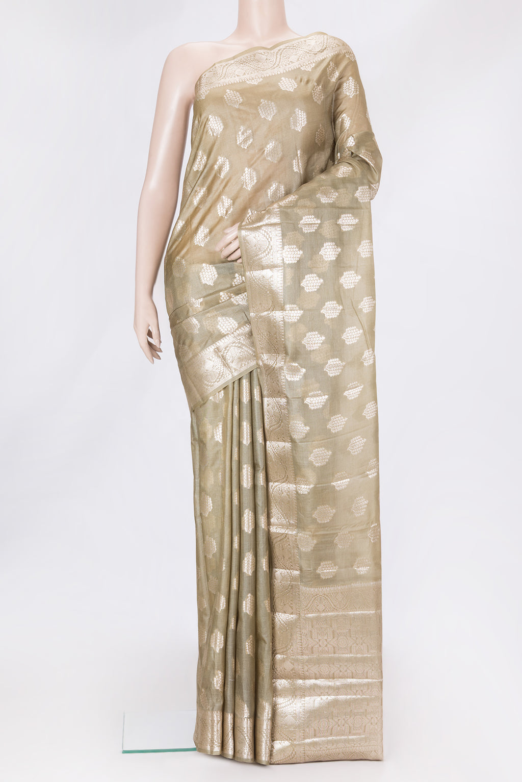 Mehandi Green Dual Tone Tussar Silk Saree with Zari Butta on the body and Zari Border.  displayed on a mannequin