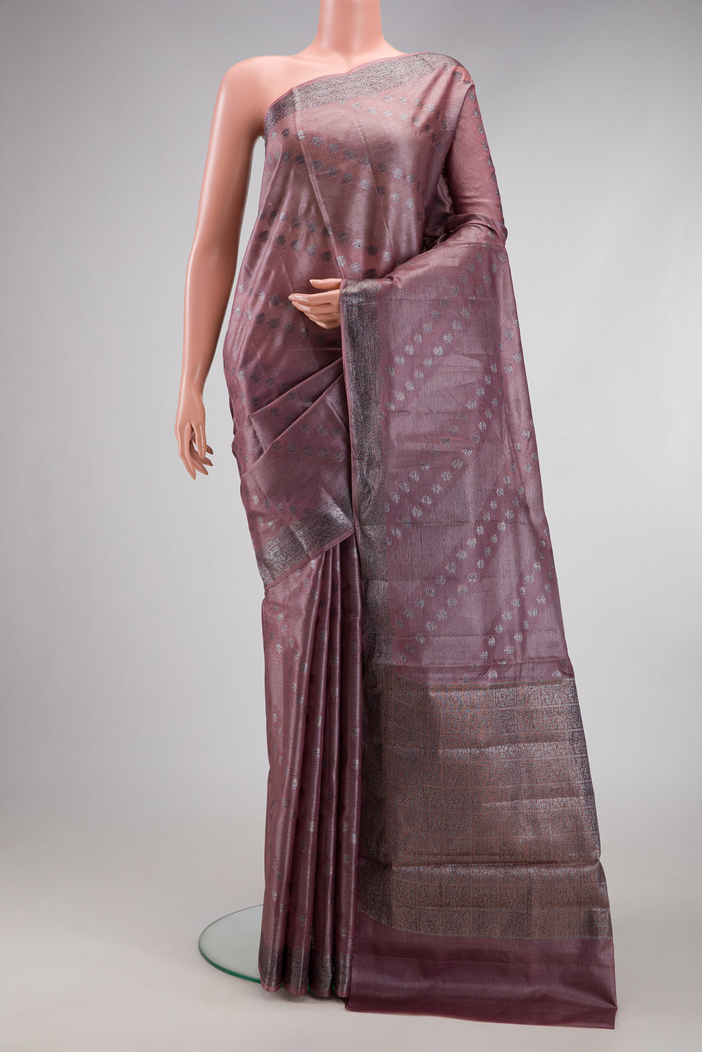 Mauve Banarasi Tussar Silk Saree with Zari Brocade on the body and Zari Border.  displayed on a mannequin