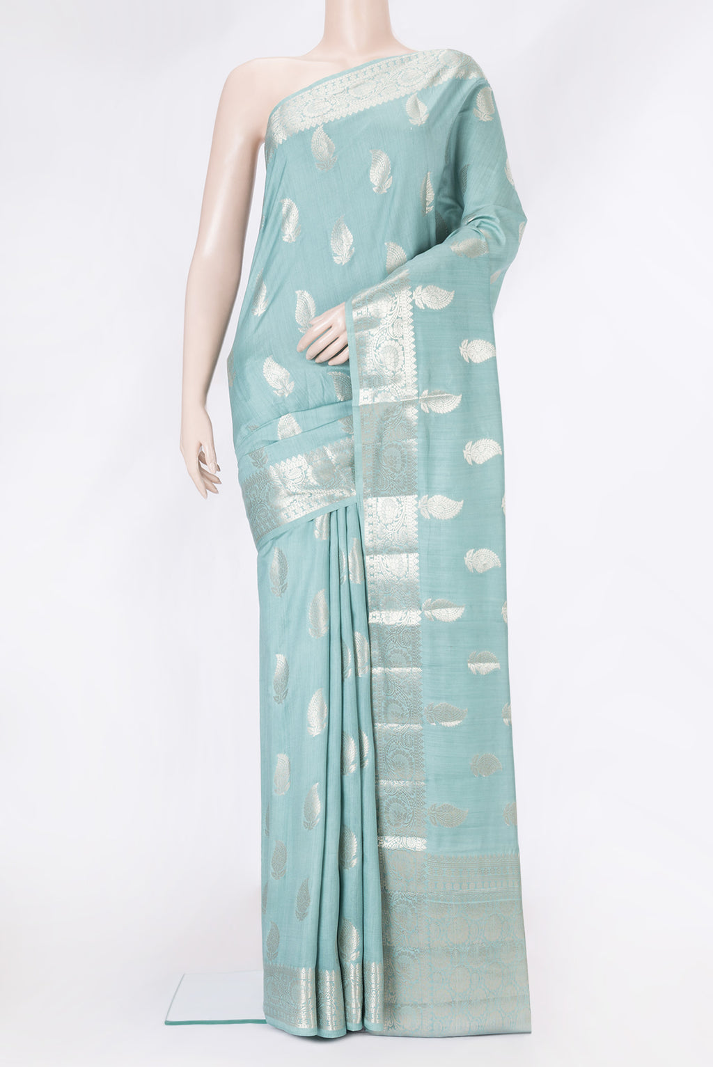 Light Blue Dual Tone Banarasi Raw Silk Saree with Zari Butta on the body and Zari Border.  displayed on a mannequin