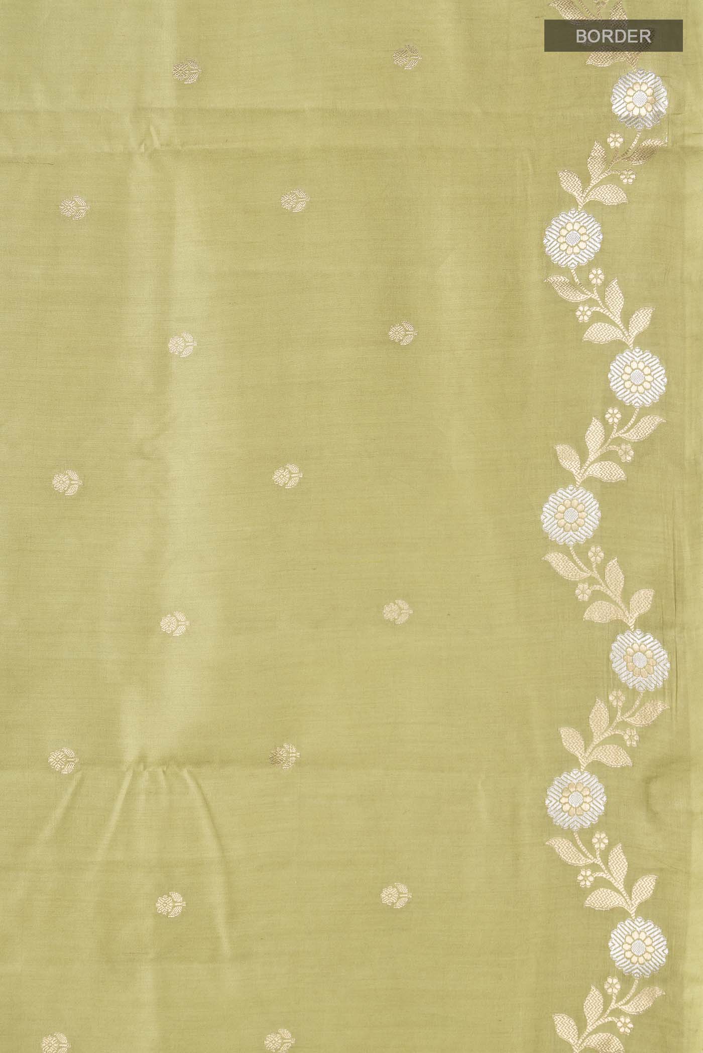 Border image of Green Banarasi Raw Silk Saree with Zari Butta on the body and Zari Border